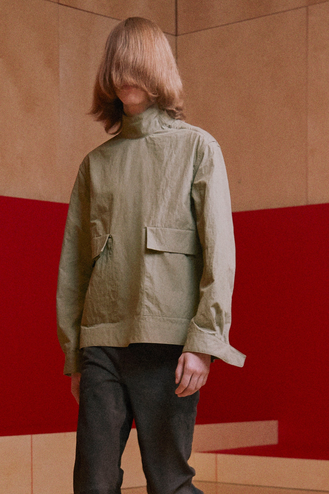 green relaxed jacket with black pants