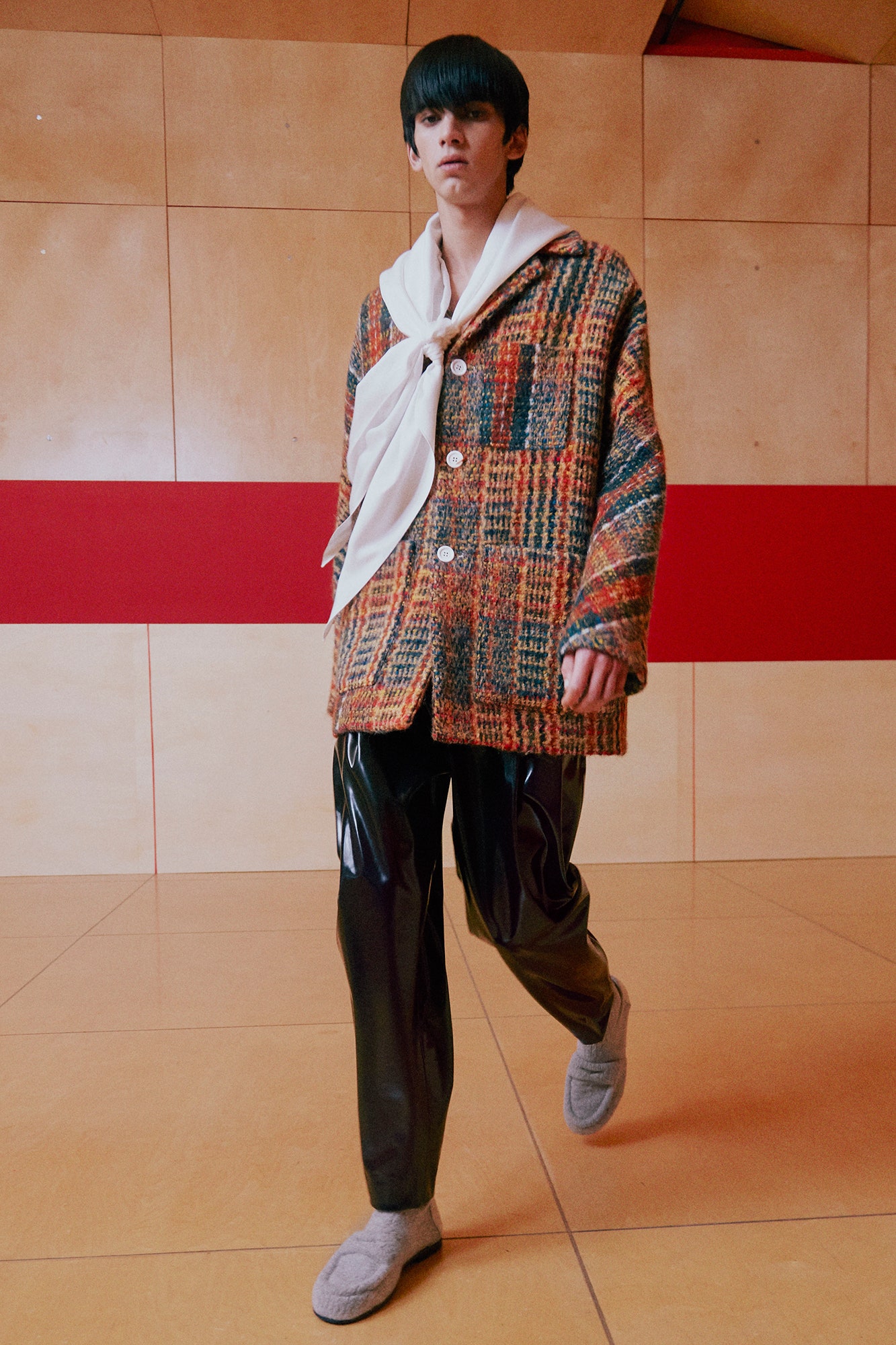 multi-colored wool jacket with vinyl pants