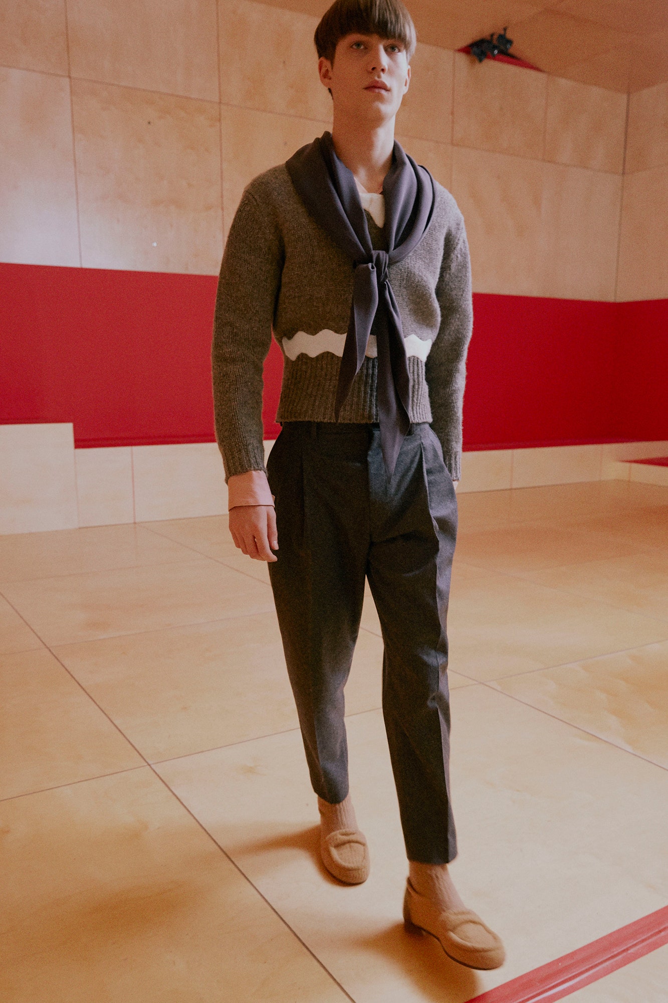 gray wool fitted sweater and black relaxed pants