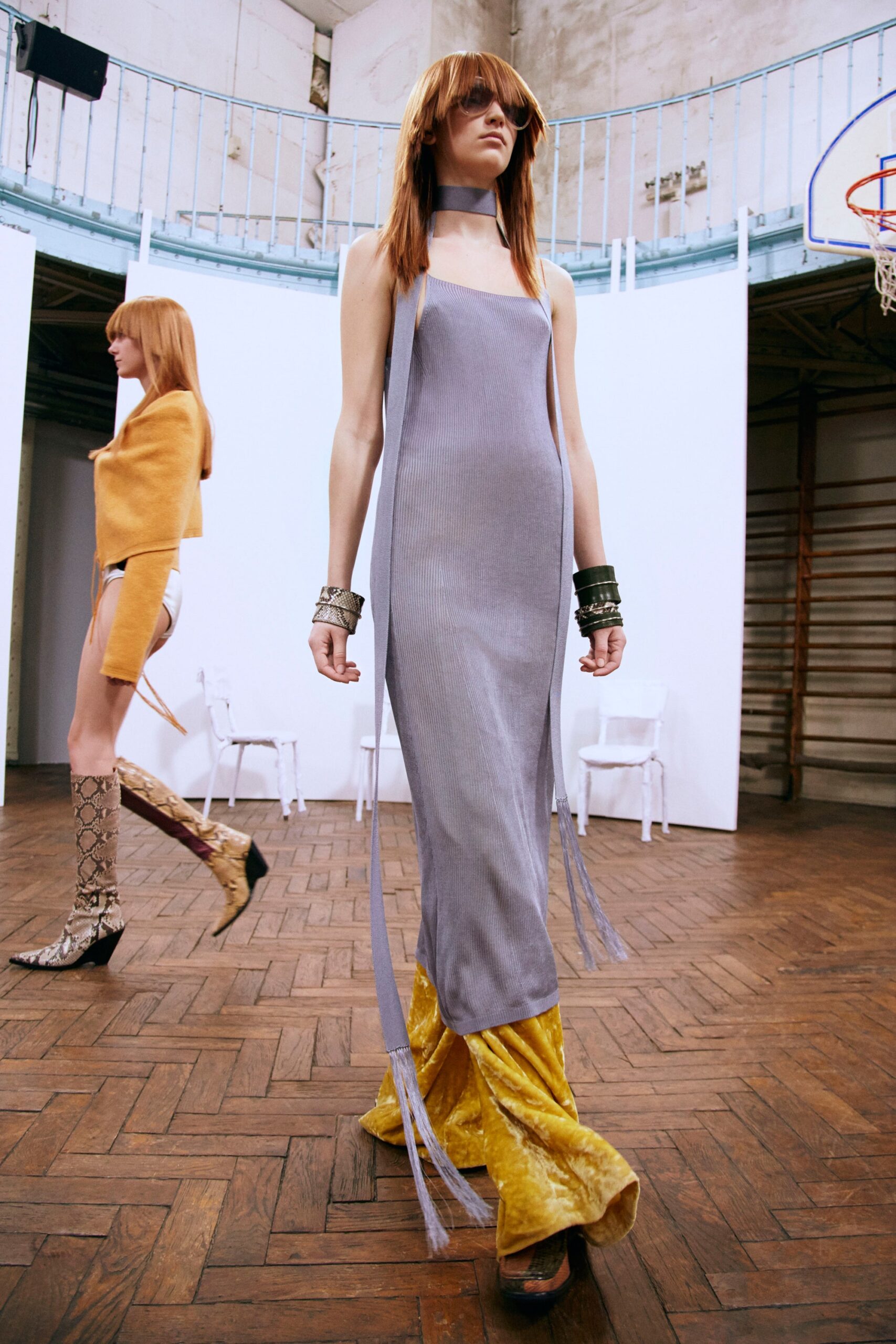 gray silk fitted dress with yellow flared pants