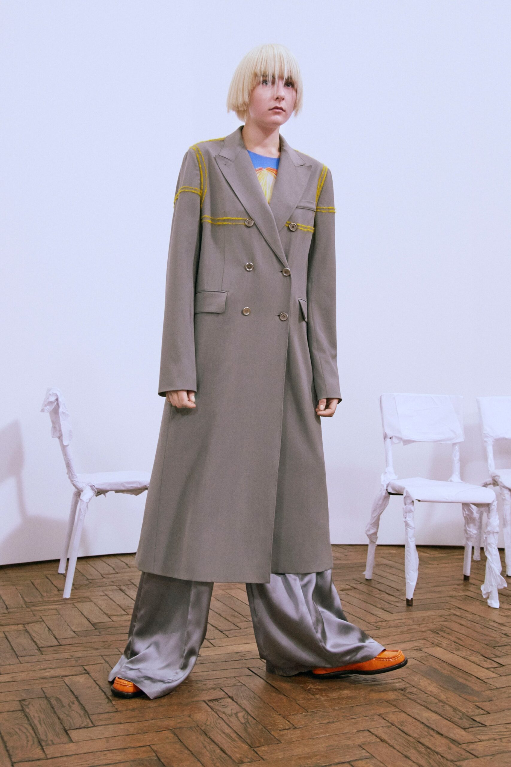 gray tailored coat with silver pants