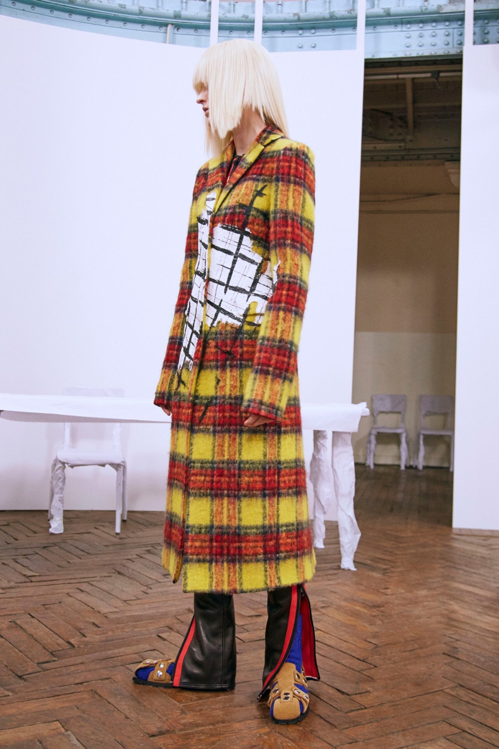 checked wool coat with leather pants
