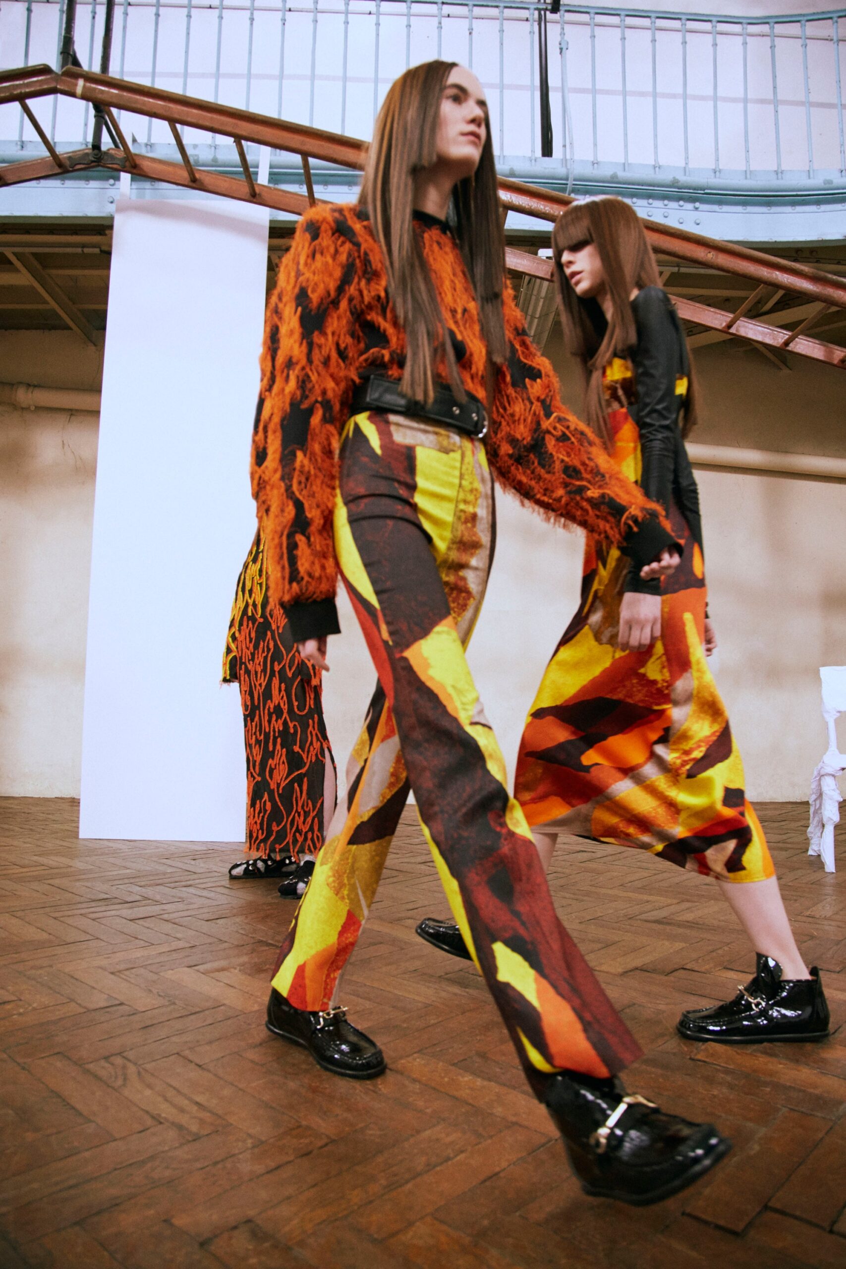 fitted ruffled top and flared pants