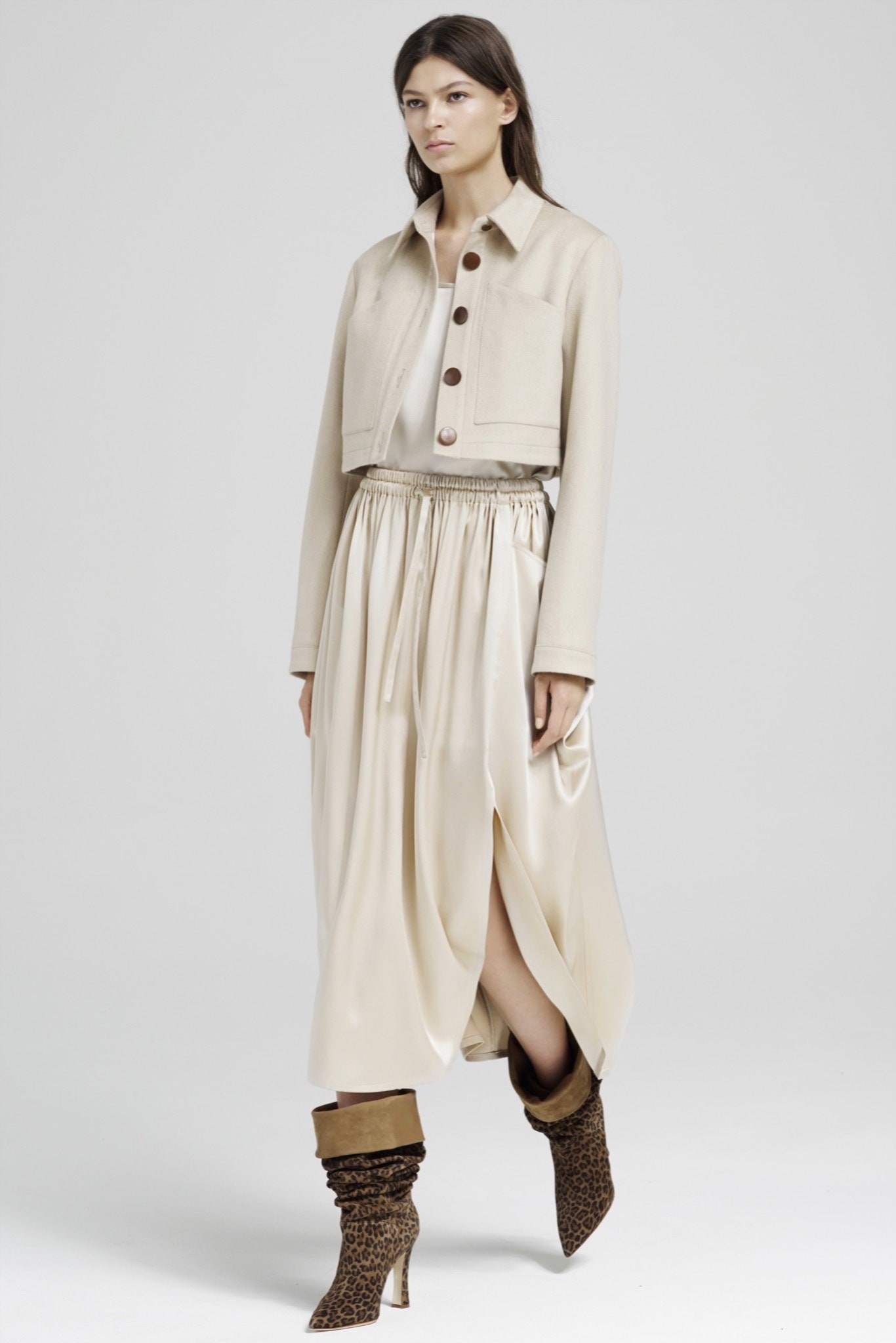 beige wool cropped jacket with cream silk skirt