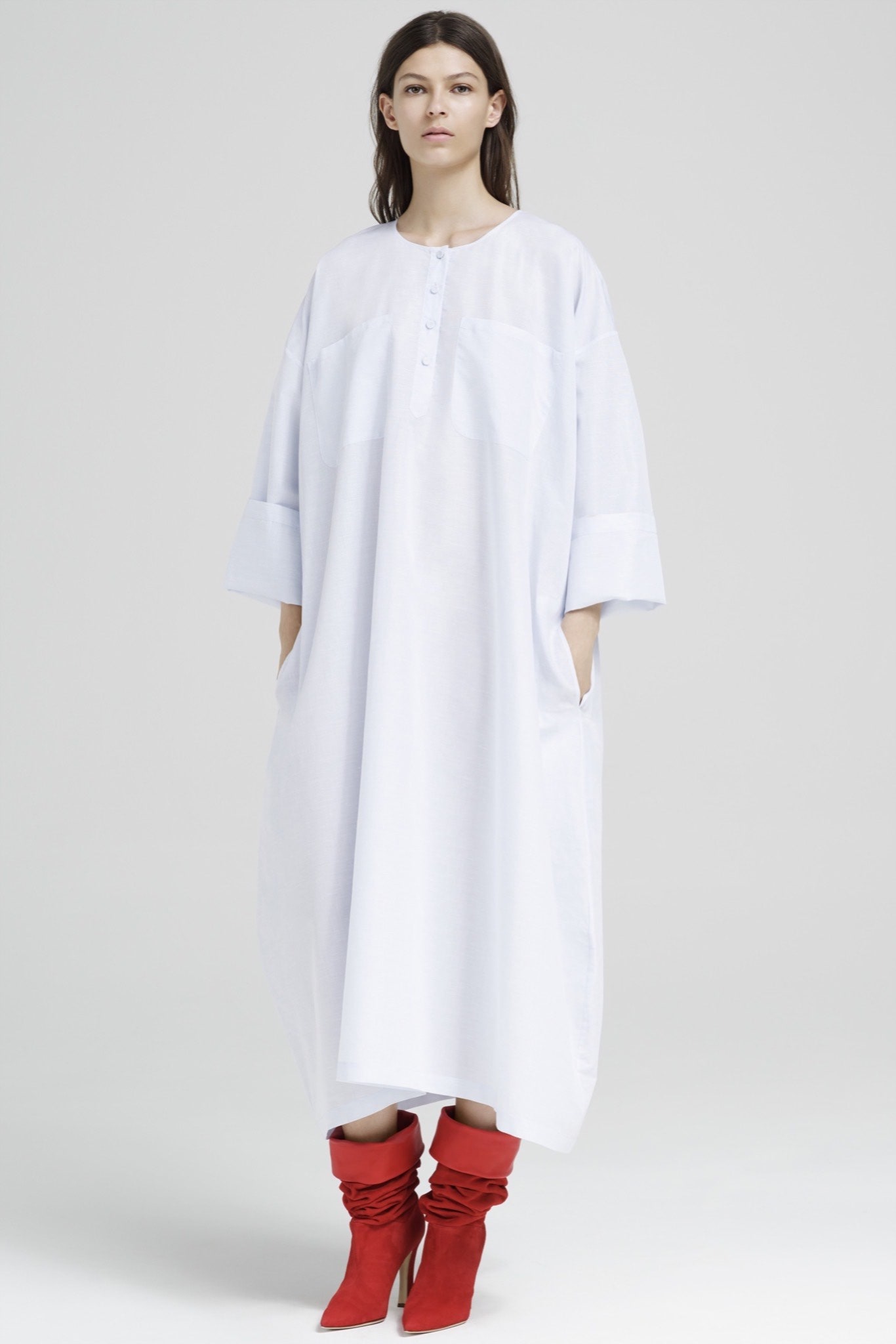 white relaxed maxi dress with red boots