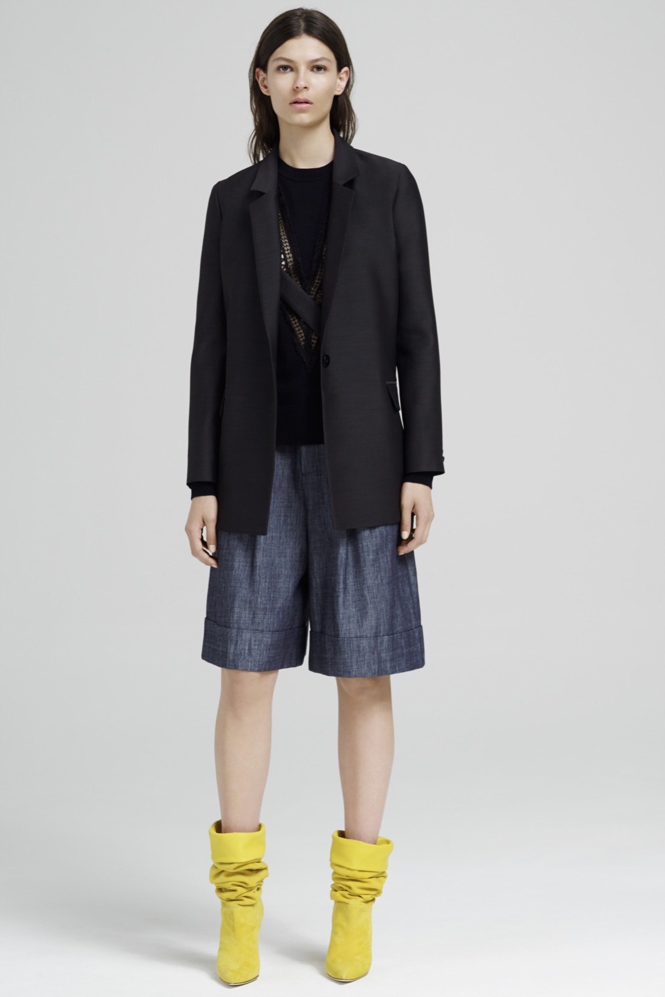 black tailored blazer with denim shorts