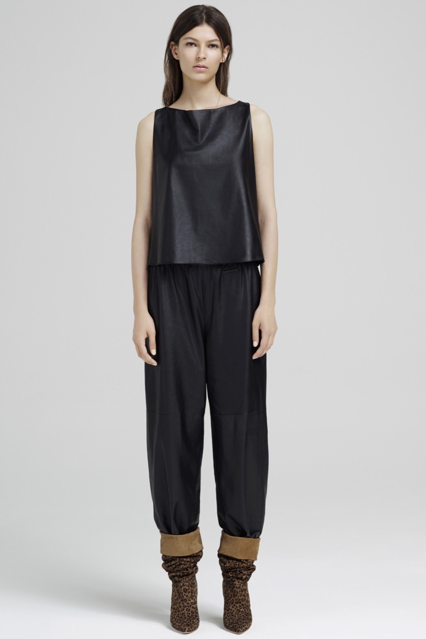black leather sleeveless top and pants
