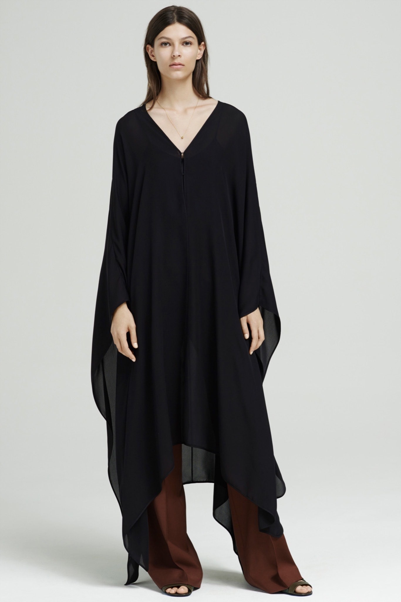 black silk cape with brown pants