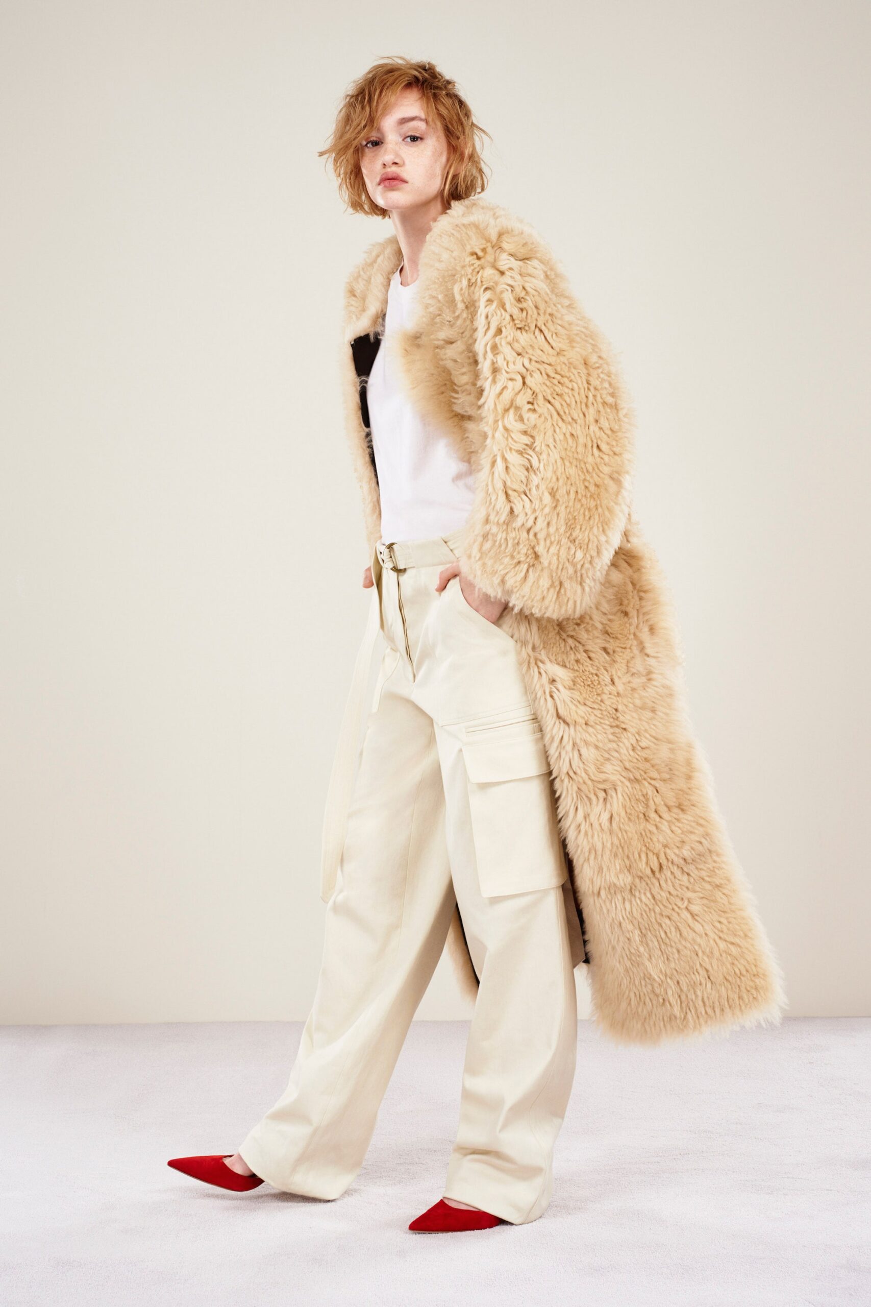 beige fur coat with cargo pants