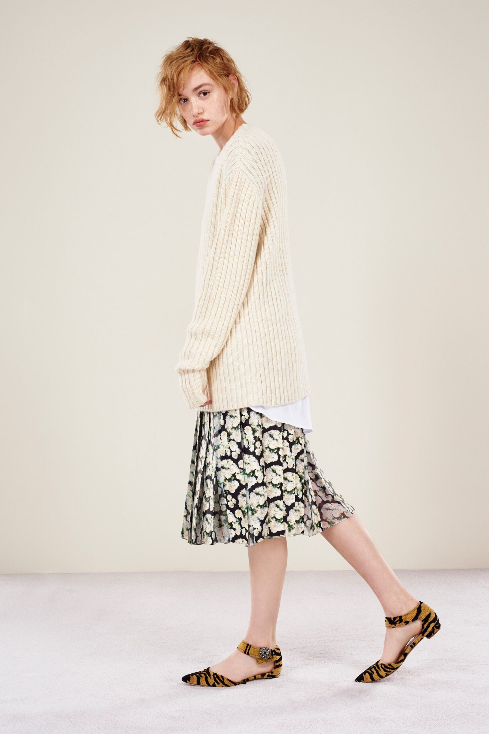 beige relaxed sweater with pleated skirt