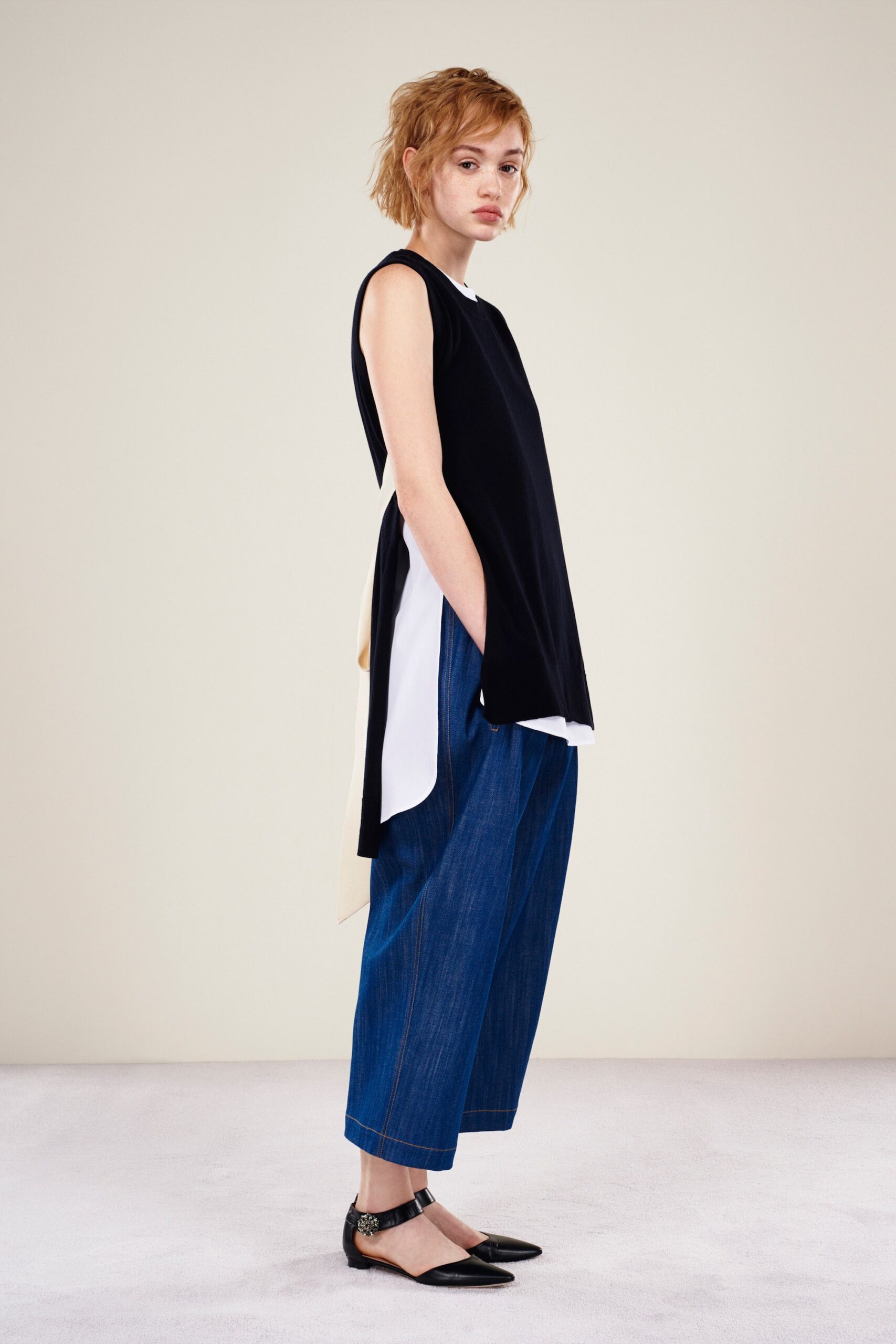 black and white relaxed top with wide-leg jeans