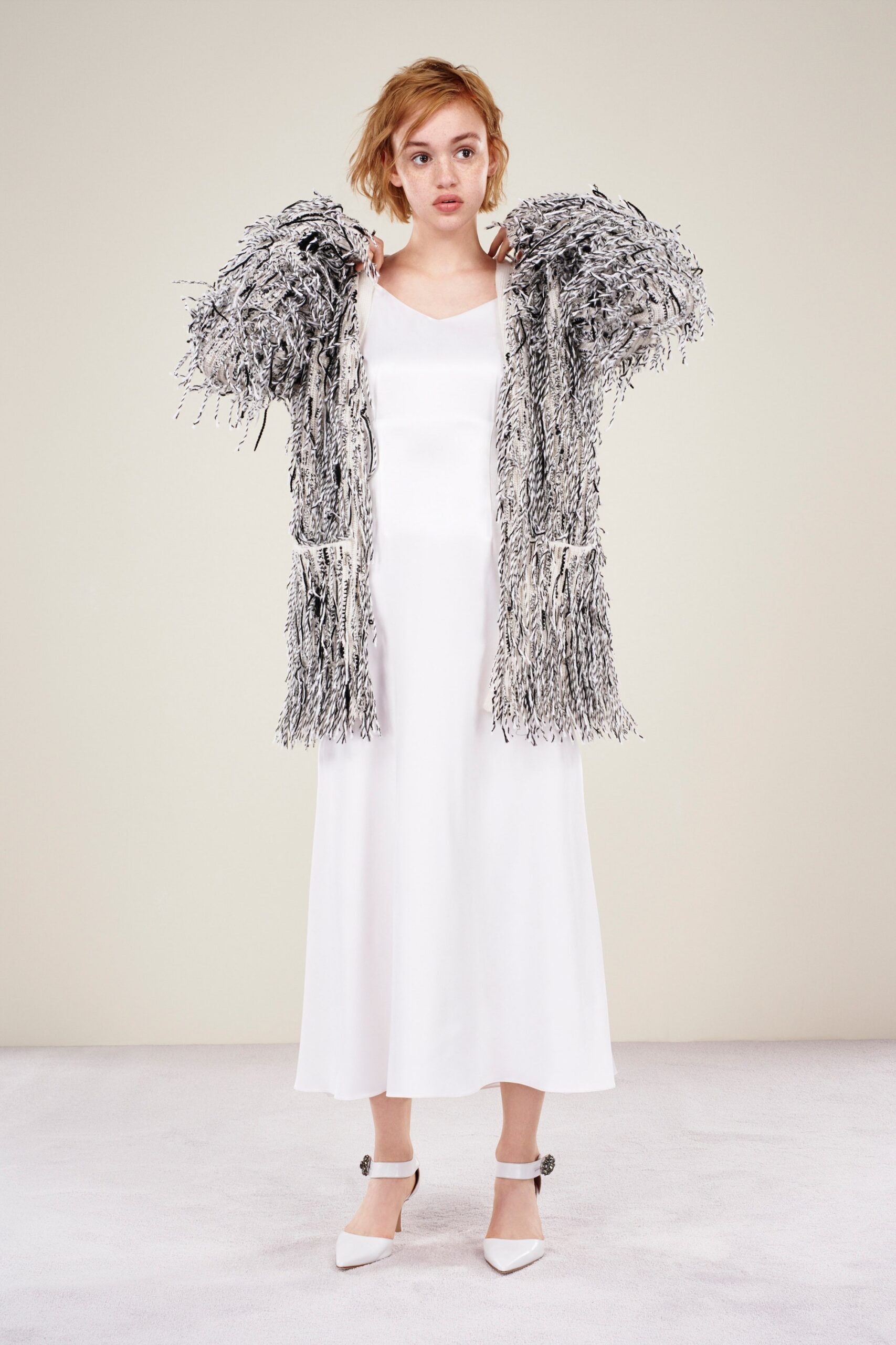 white silk midi dress with fringed coat