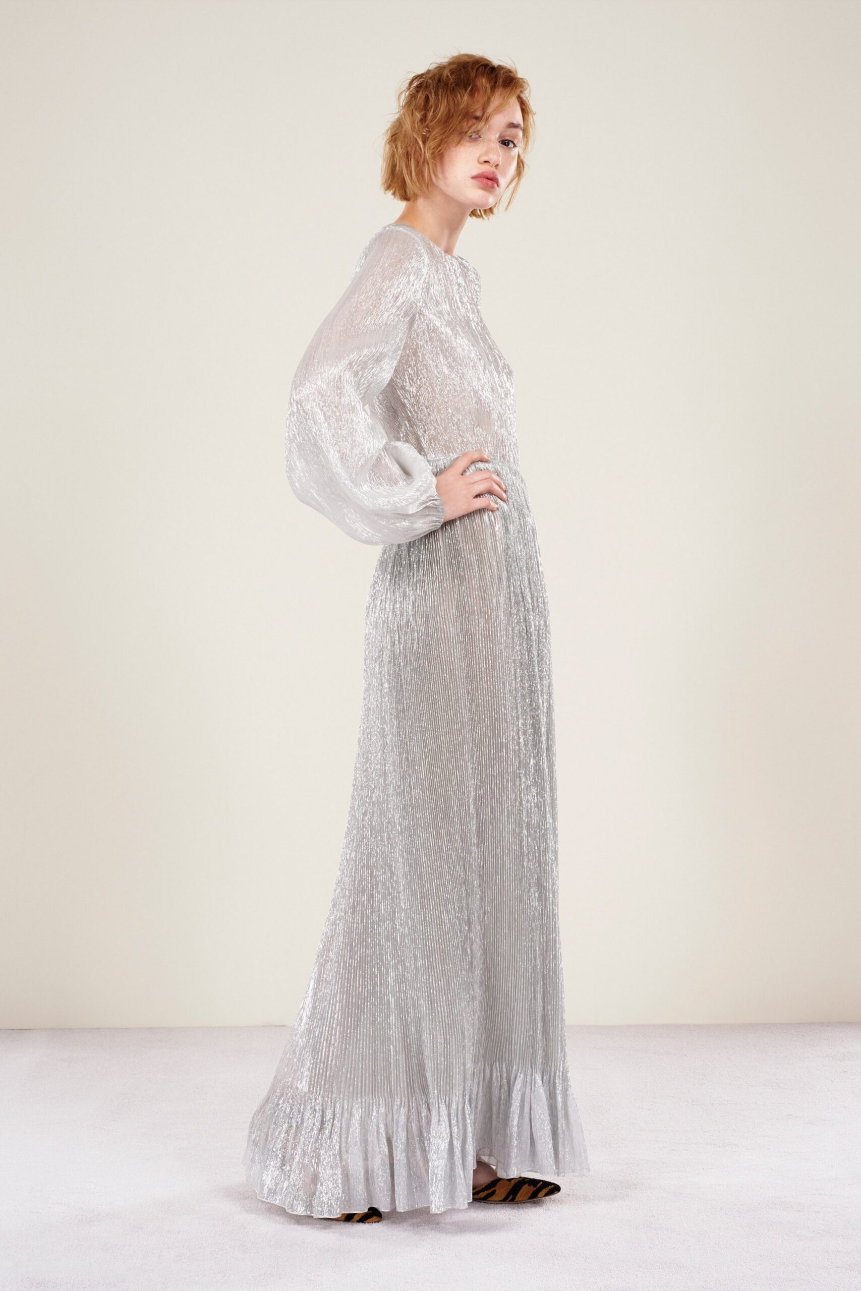silver pleated long-sleeve gown