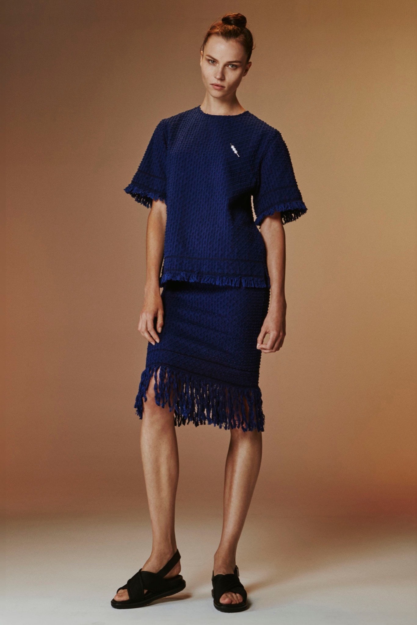 blue fringed top and skirt
