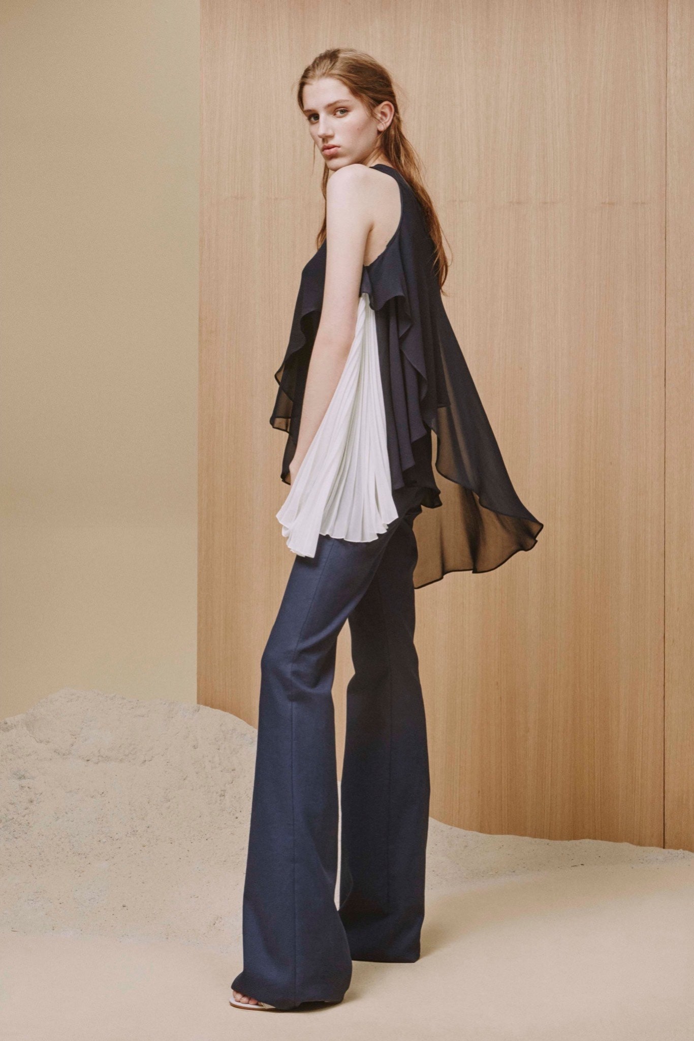 black silk sleeveless high-neck relaxed layered ruffled top