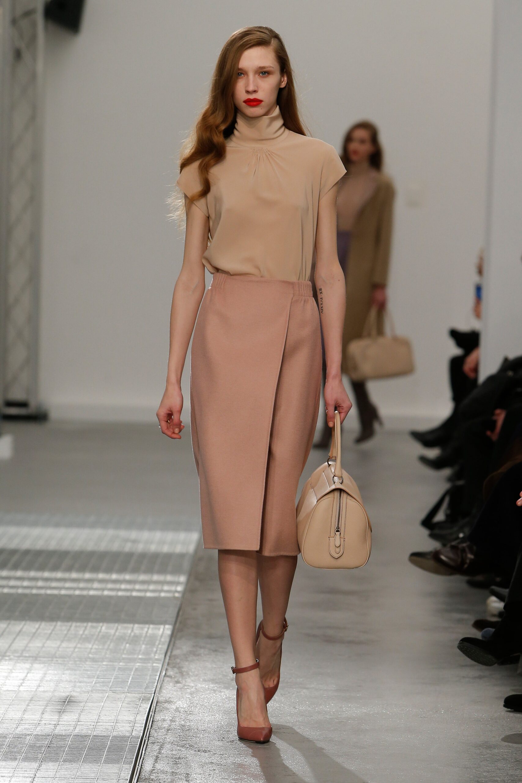 beige silk top with pink skirt