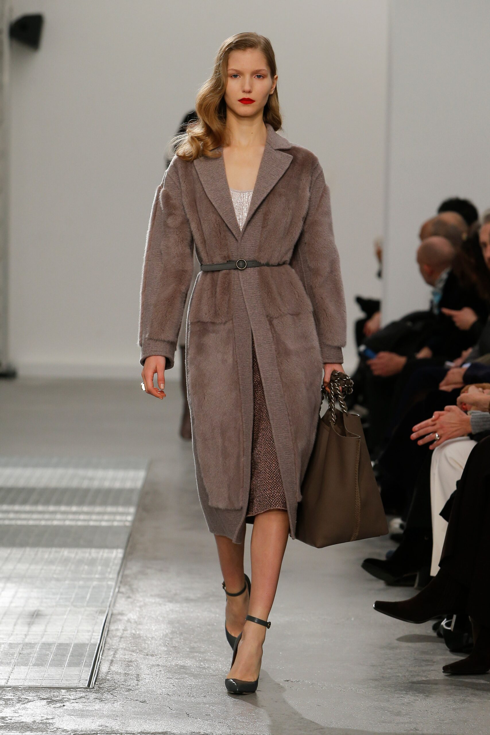 gray faux-fur coat with belted dress