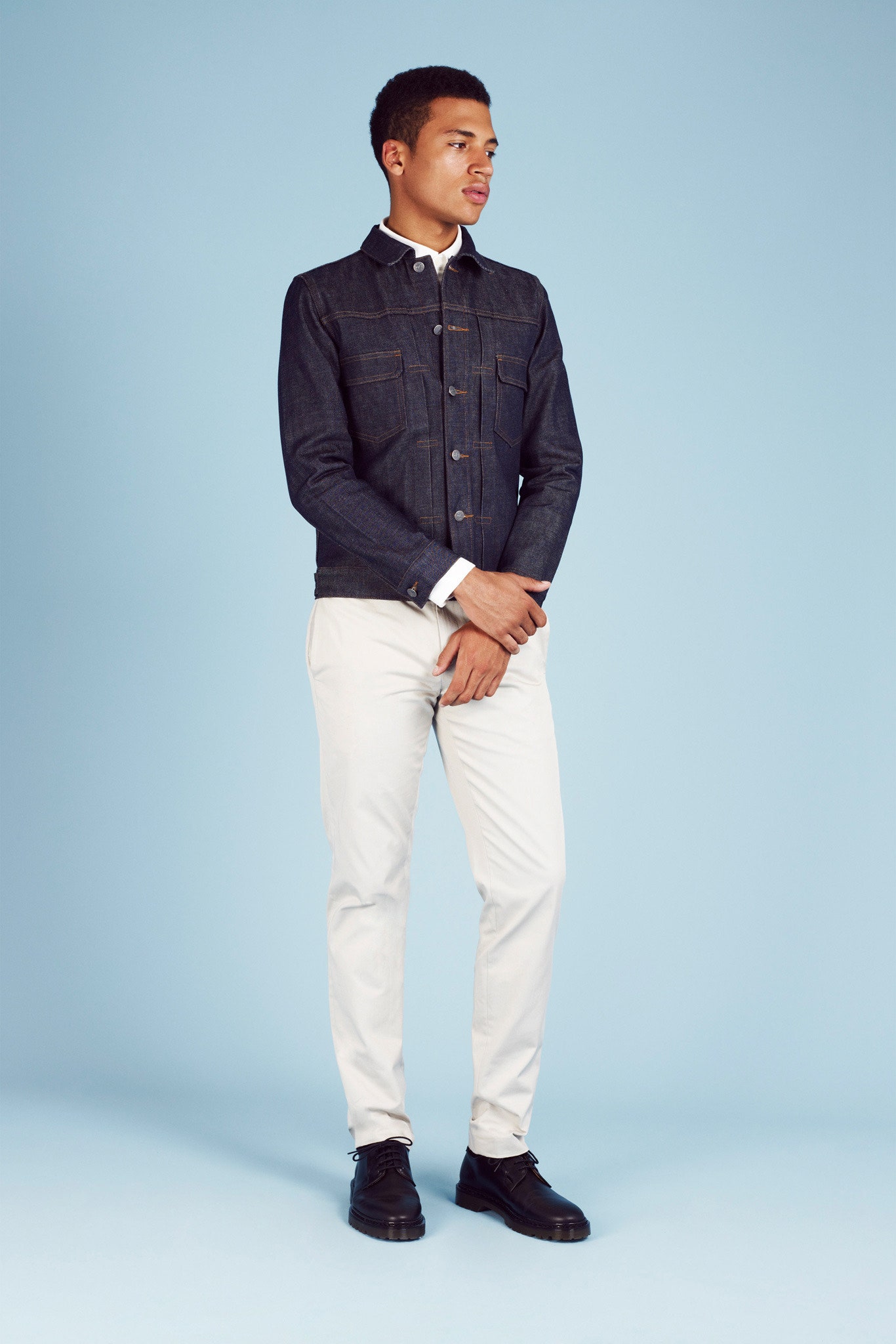 fitted denim jacket and slim white pants