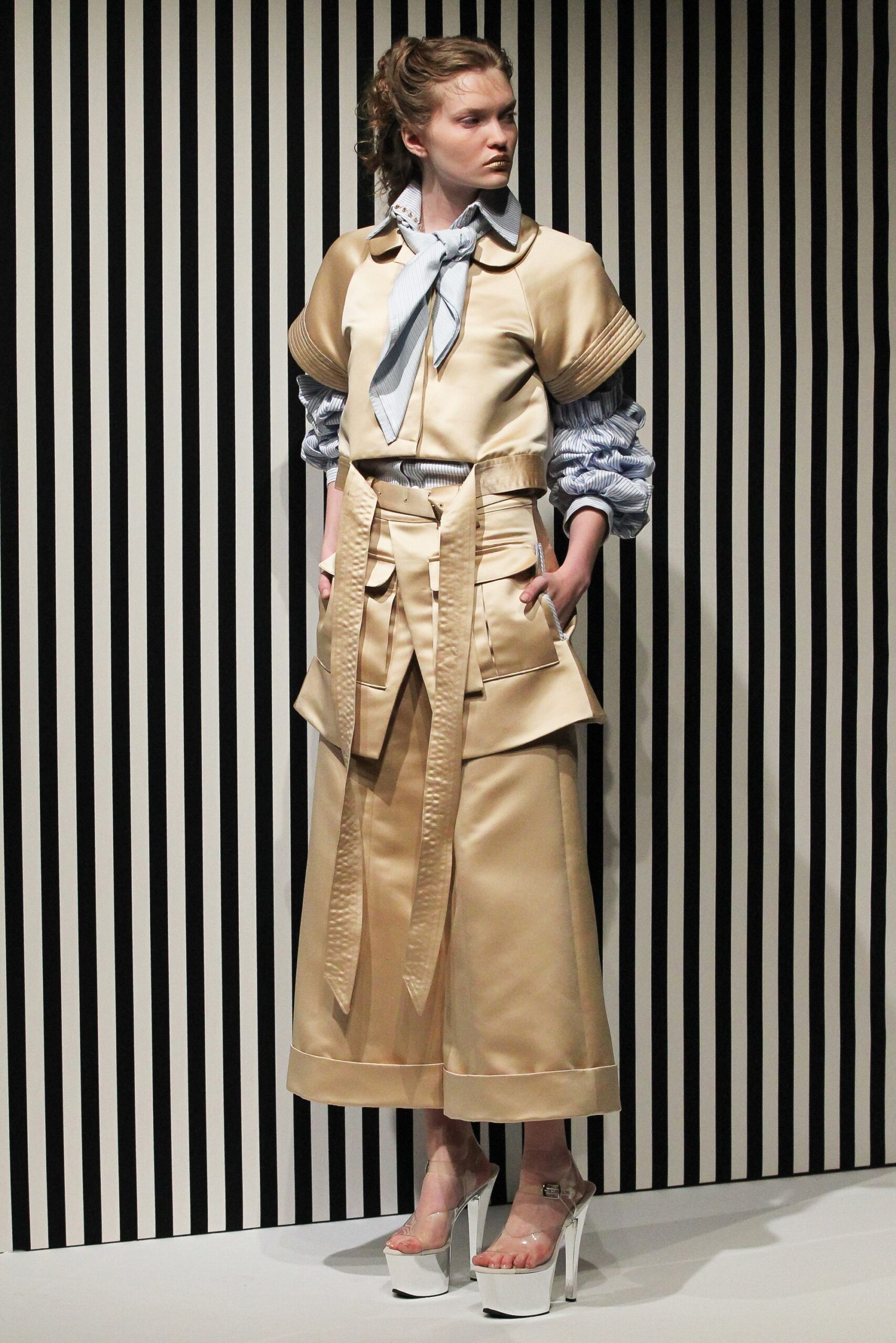 beige silk jacket and wide-leg pants