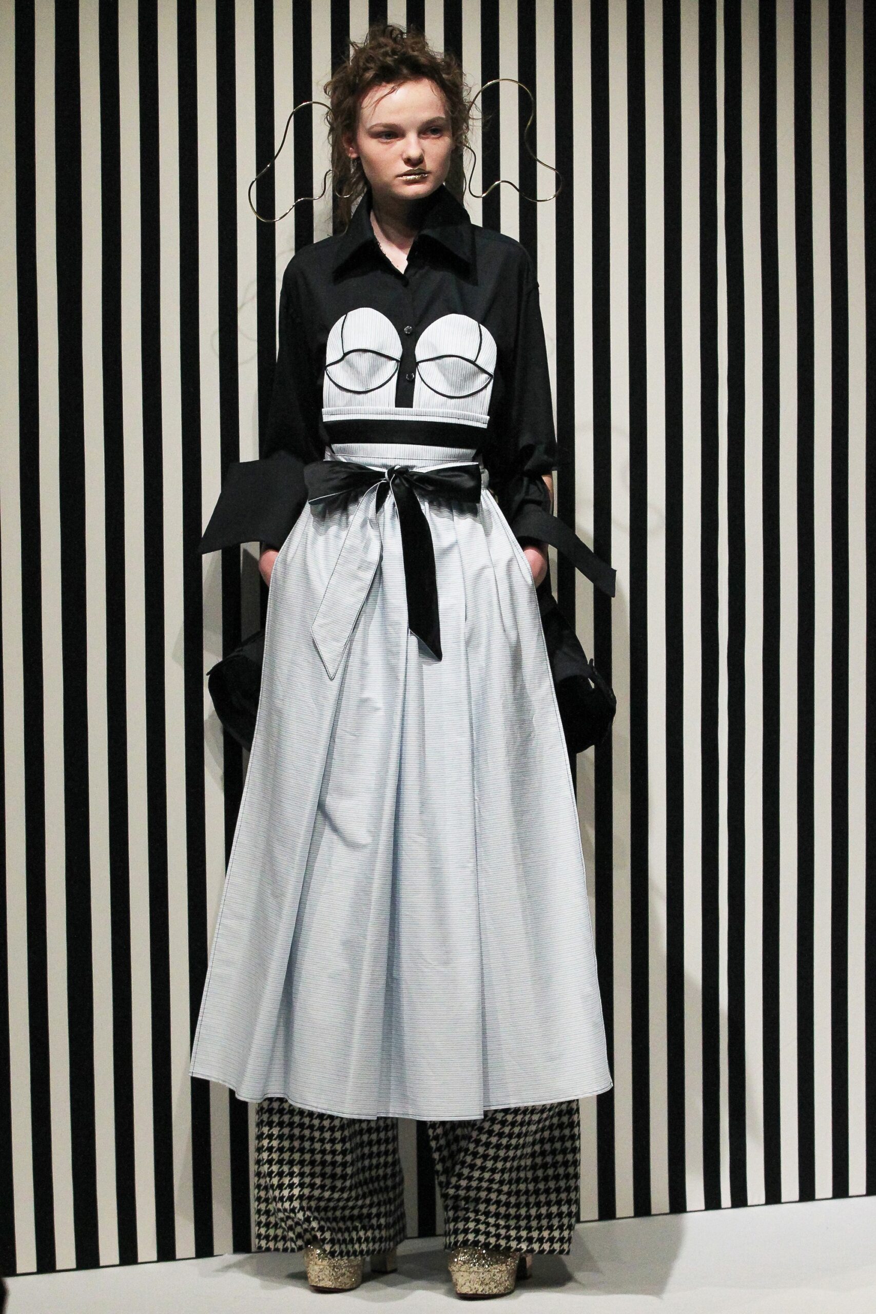 black and white shirt-dress with checked pants