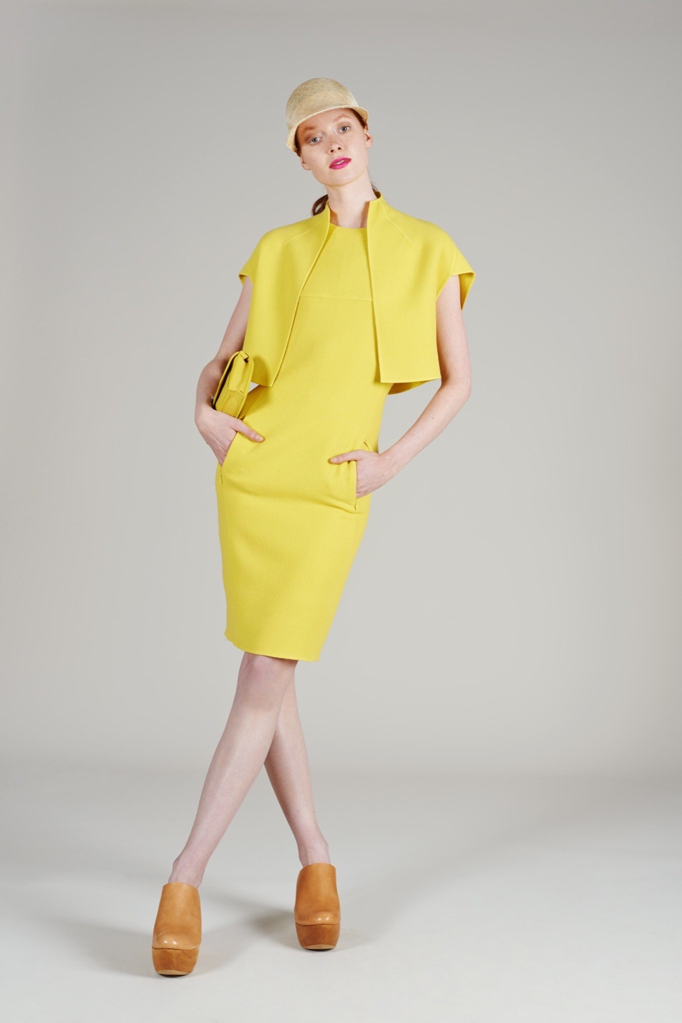 yellow fitted dress with cape