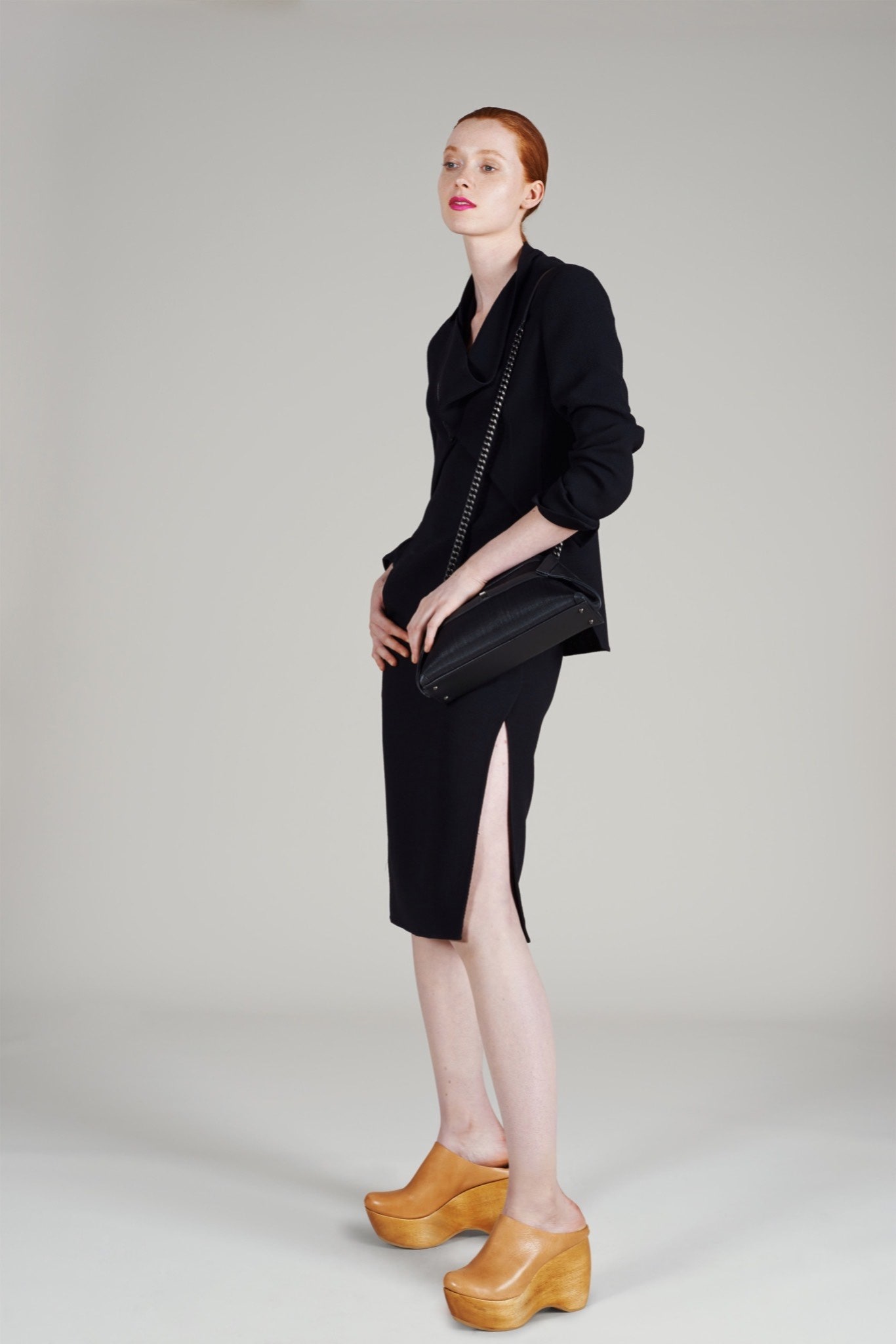 black fitted midi dress with slit