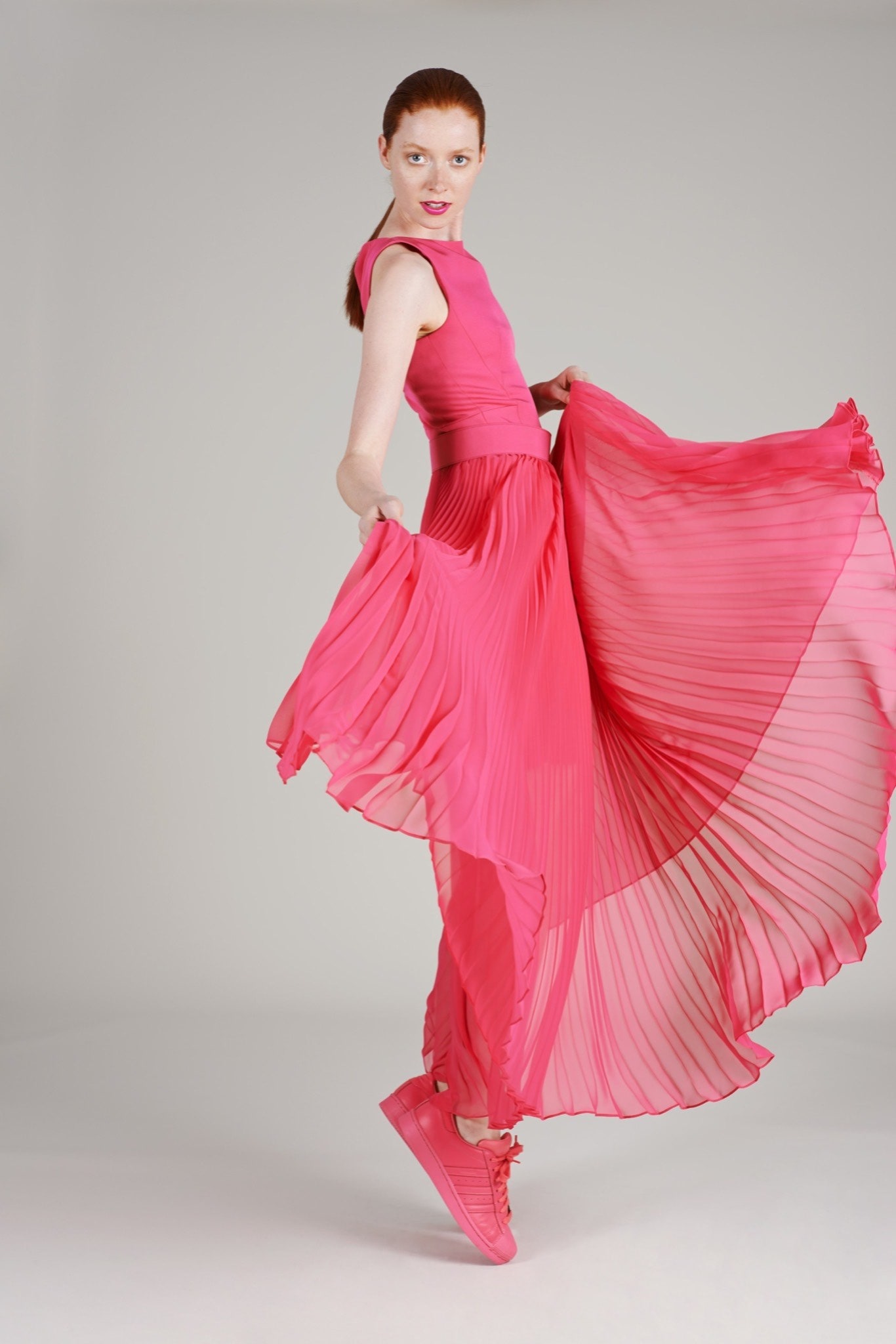 pink pleated maxi dress with sneakers