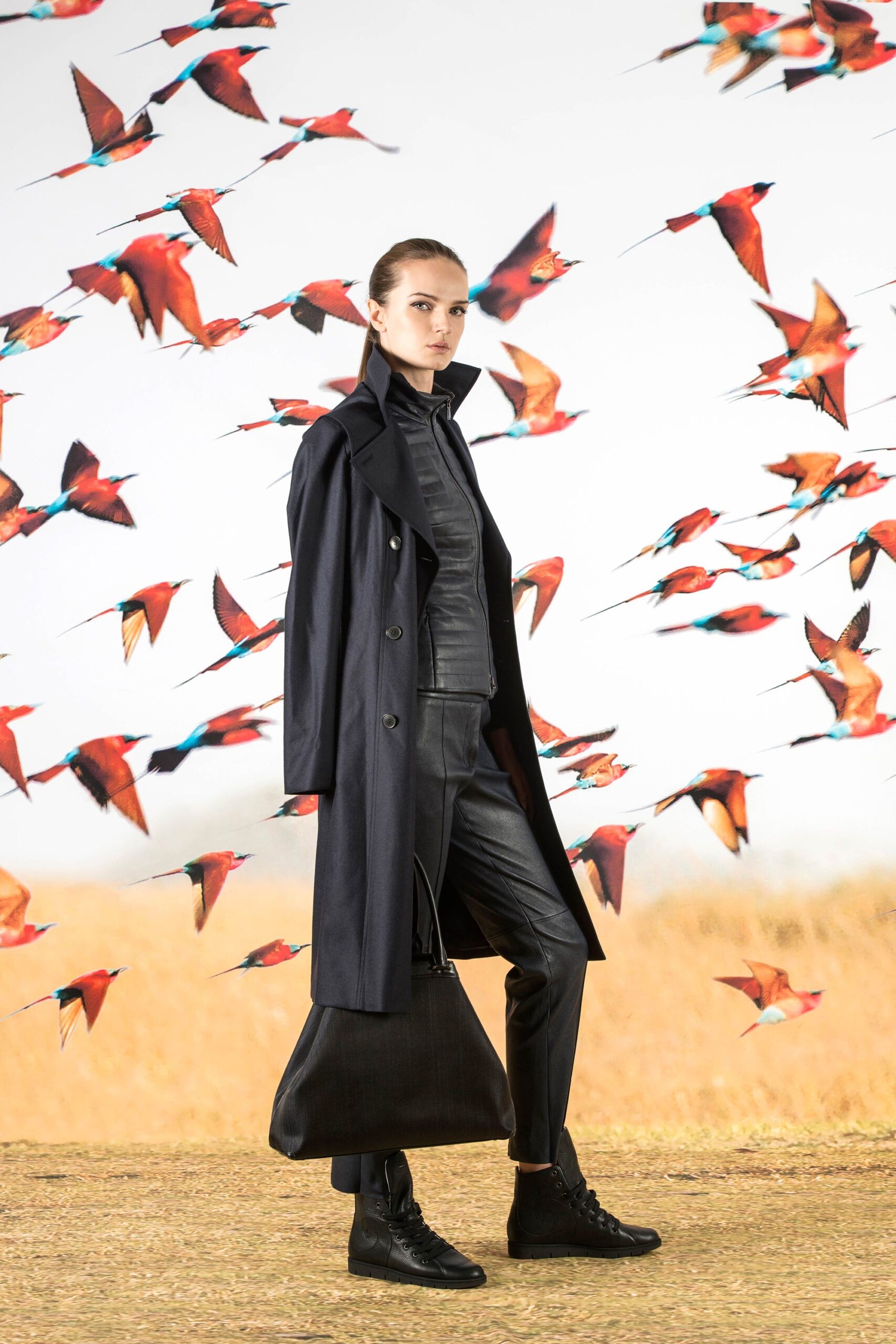 black trench coat and leather pants