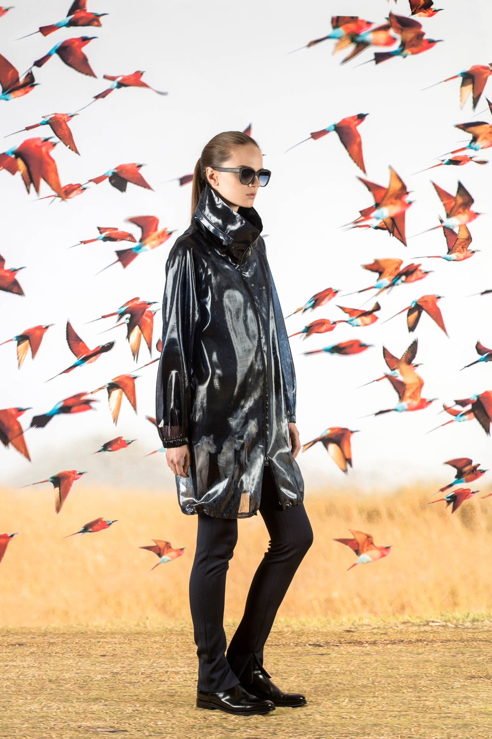 black vinyl coat with slim pants