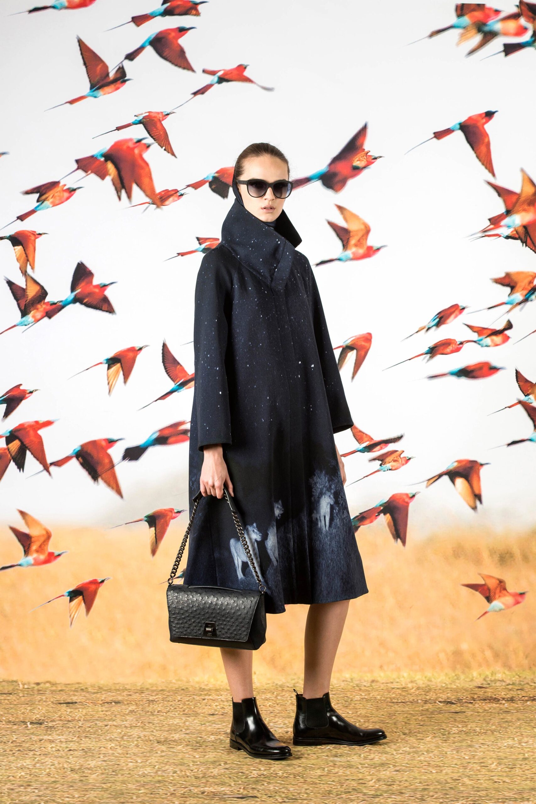 black wool long-sleeve high-neck relaxed draped midi coat