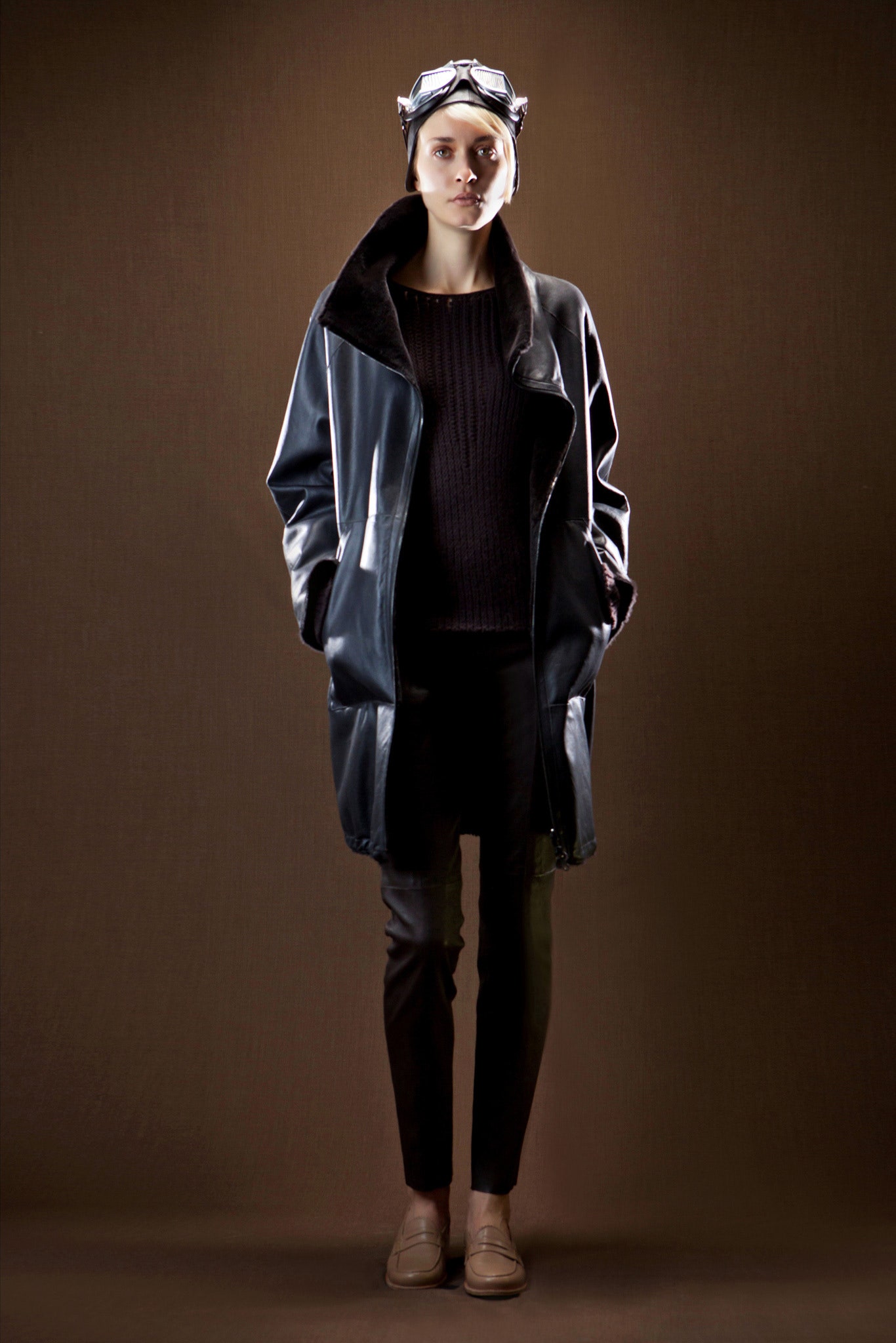 black leather long-sleeve collared relaxed pockets coat