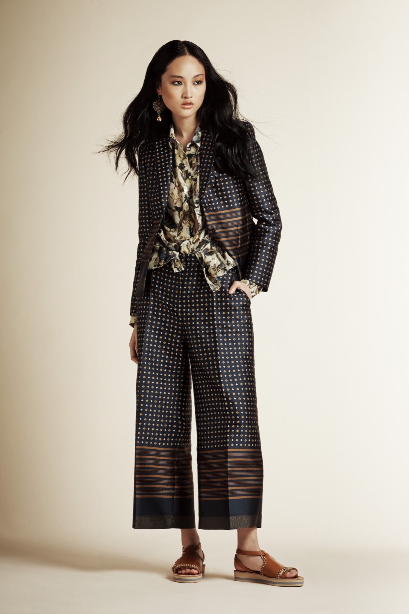 printed black and beige suit