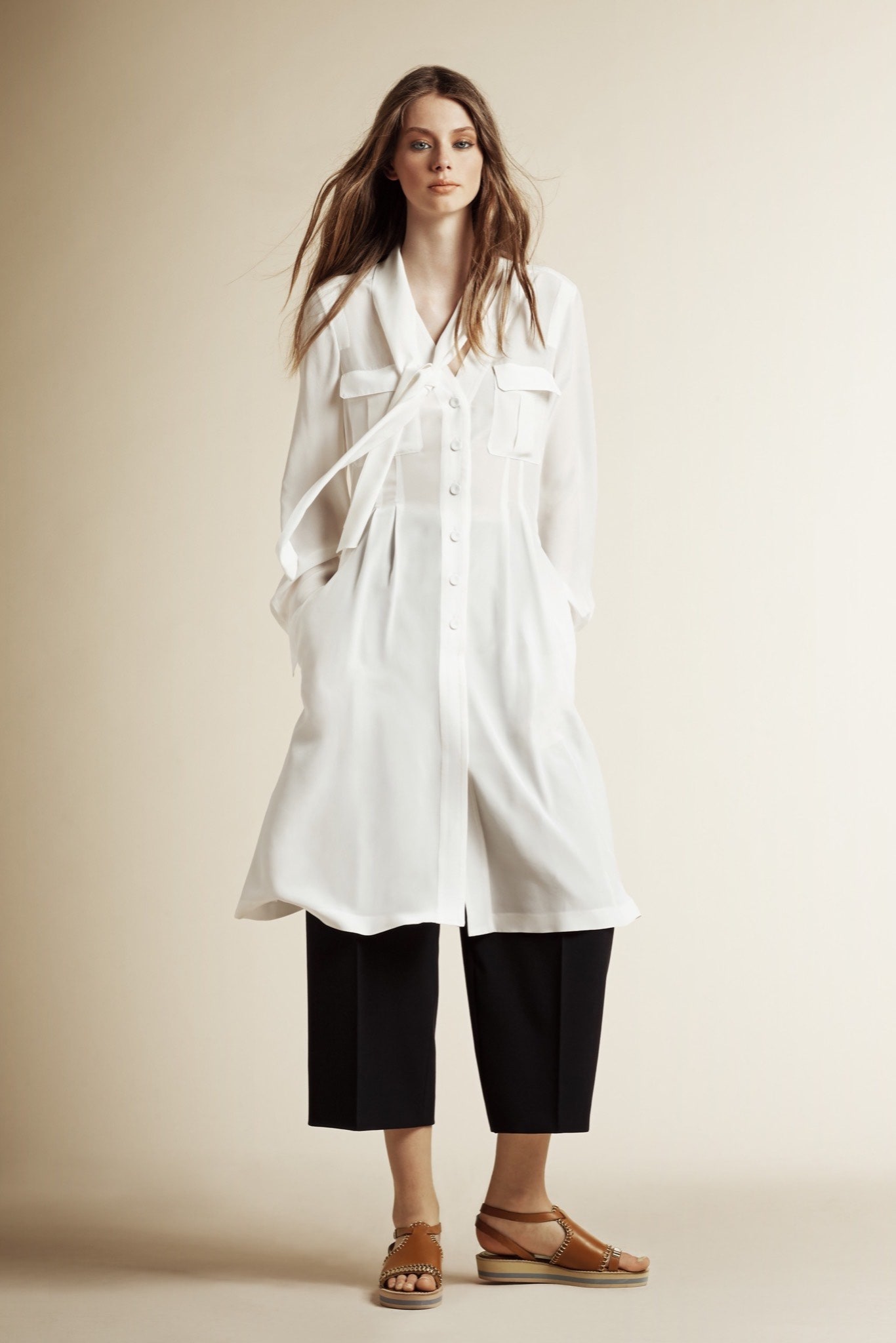 white silk shirt-dress with black pants