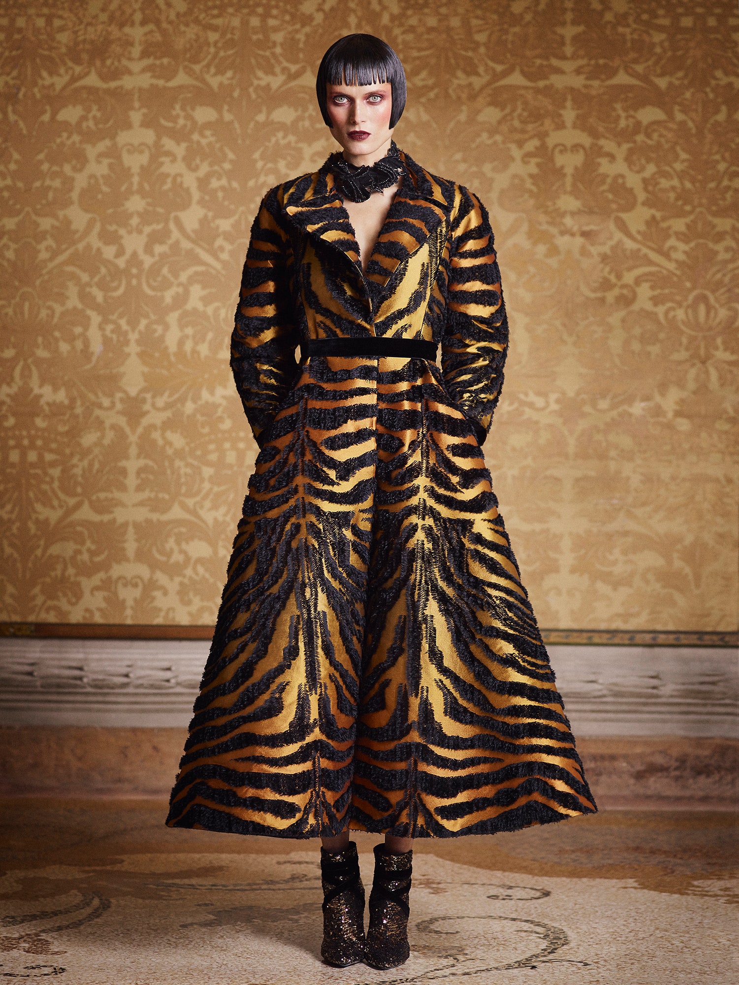 black and gold printed coat