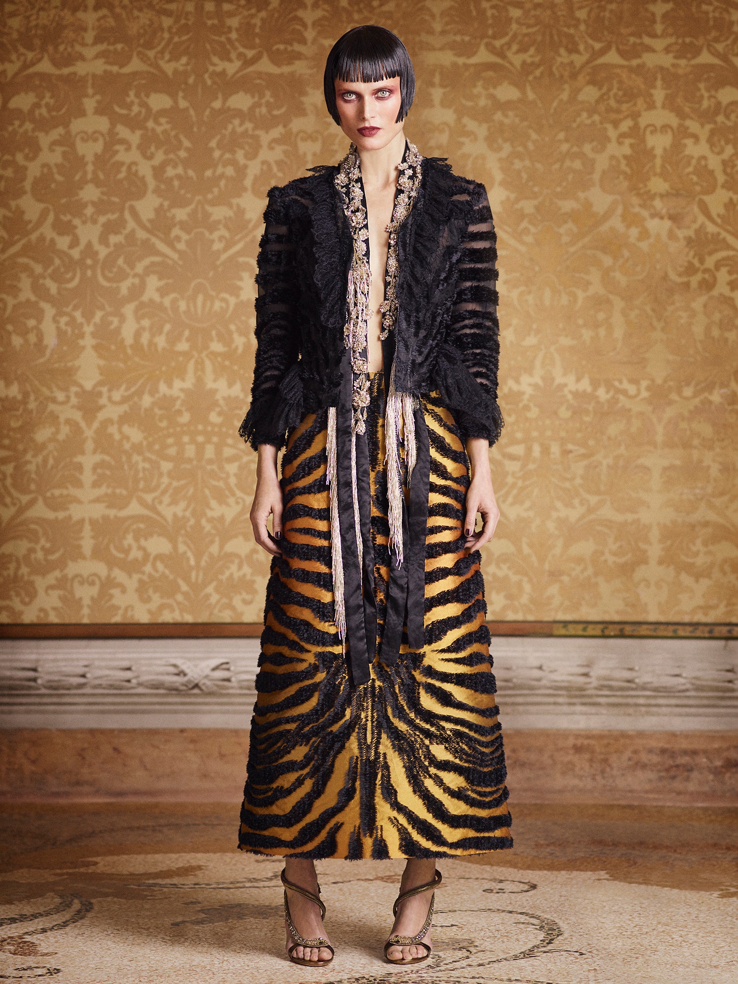 black fur coat and tiger print skirt