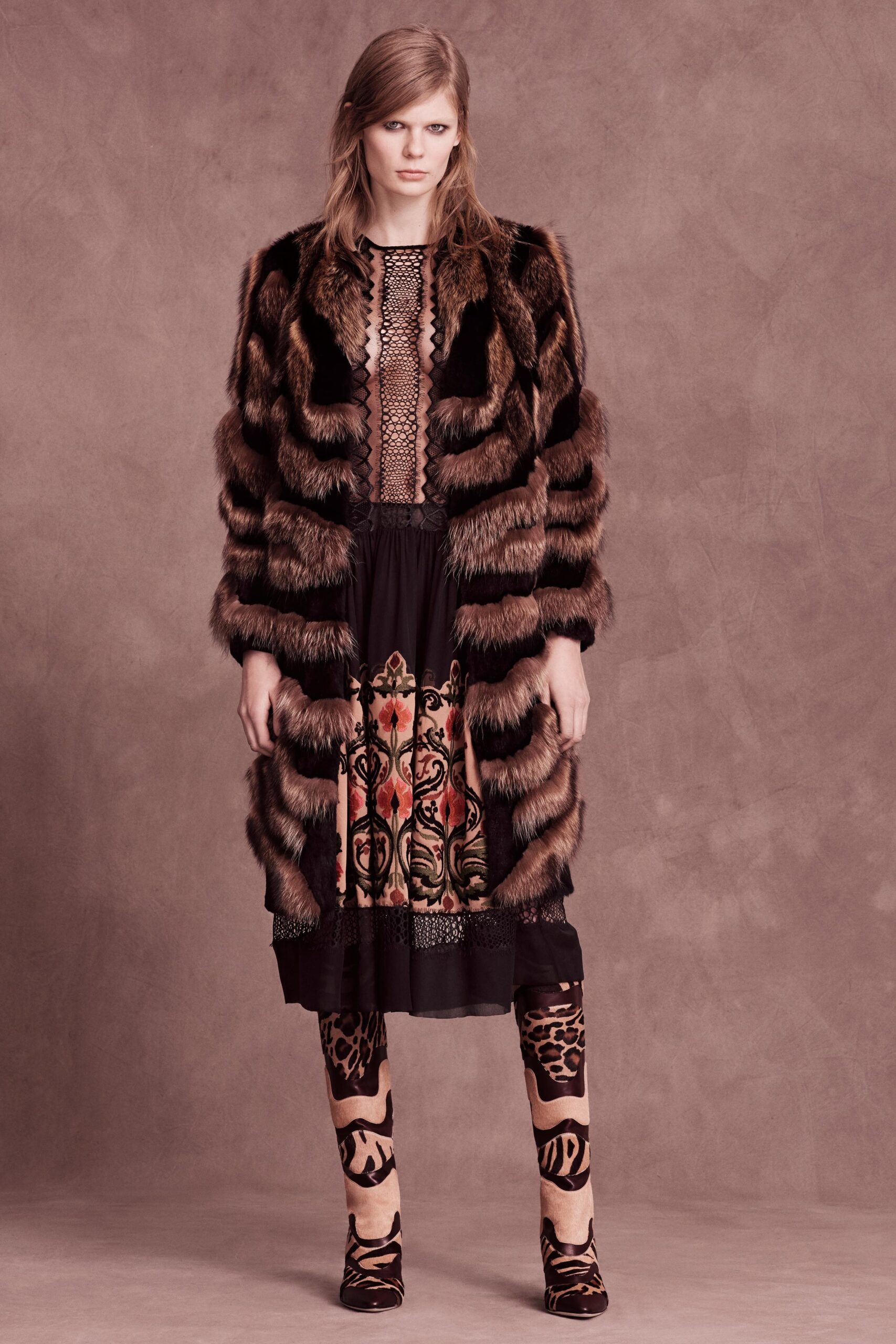 brown fur coat with black dress