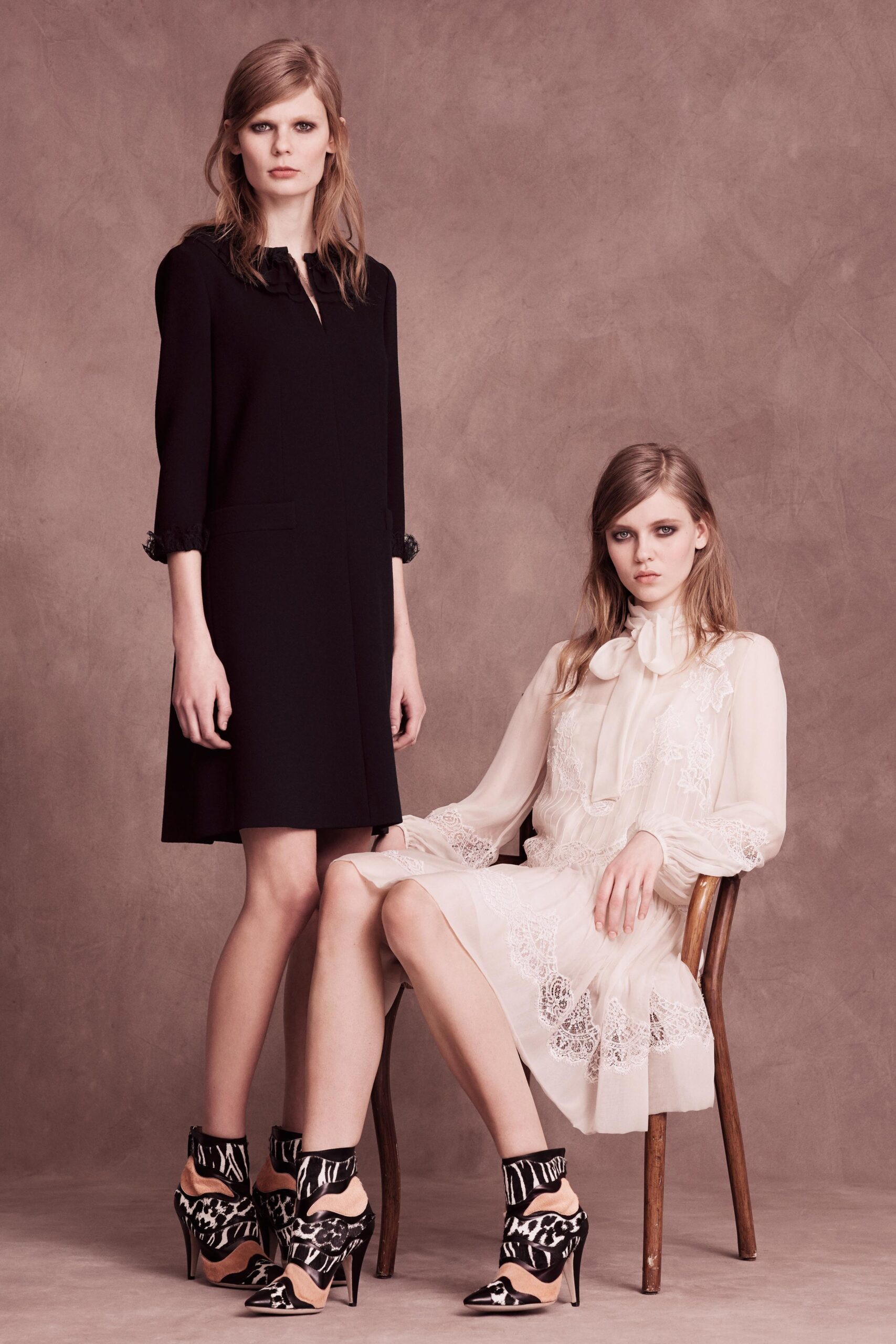black silk long-sleeve dress and white chiffon sleeveless dress