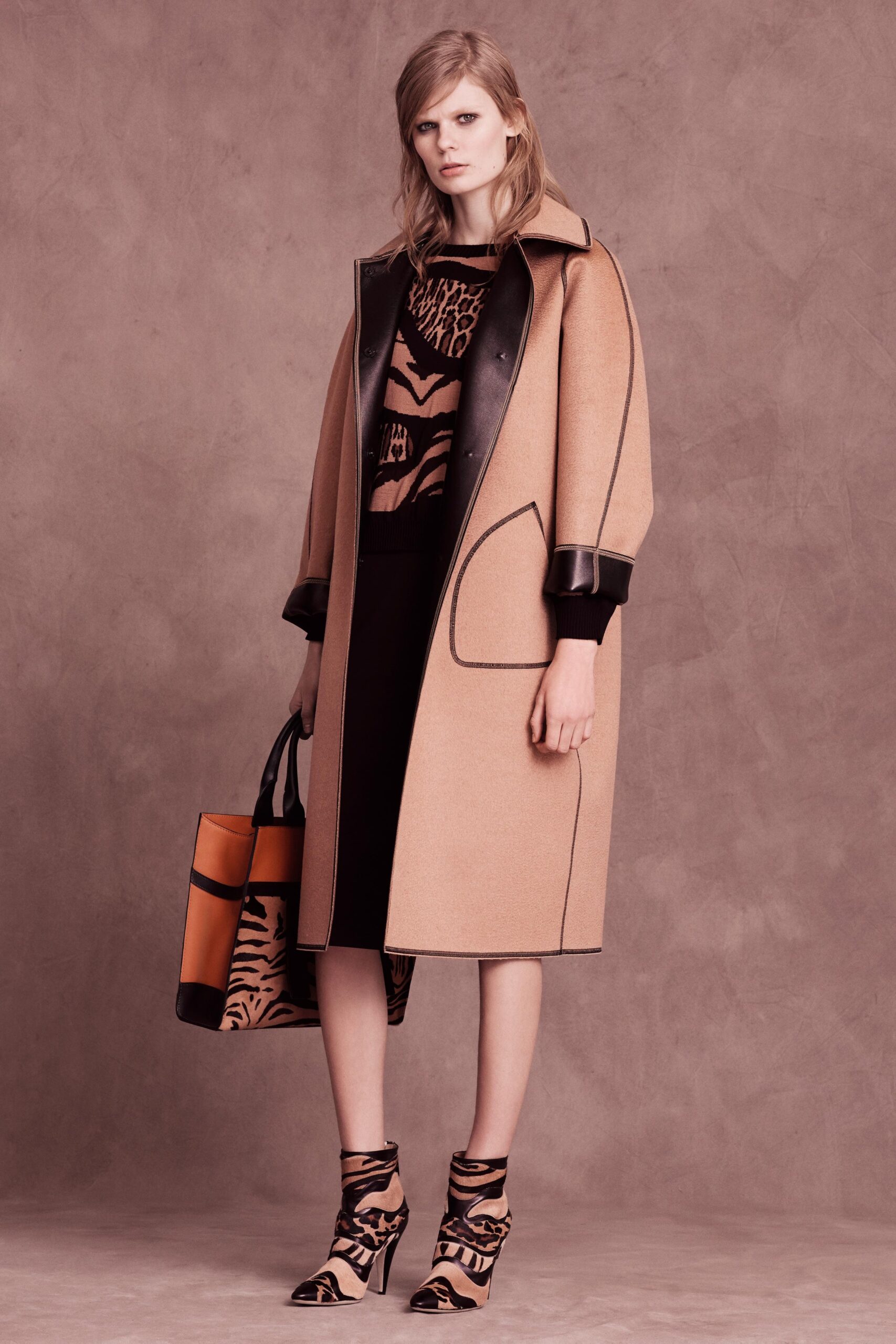 beige wool coat with black dress