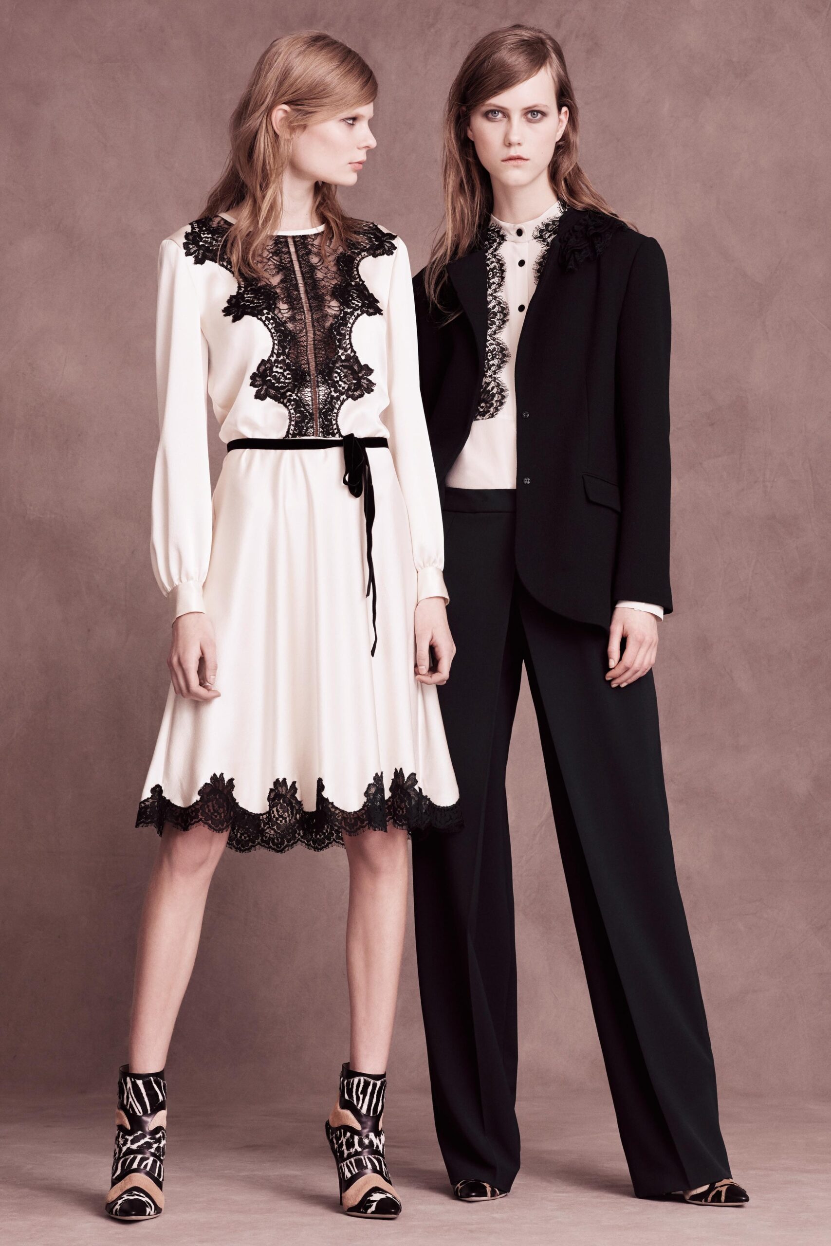 white embroidered midi dress and black suit