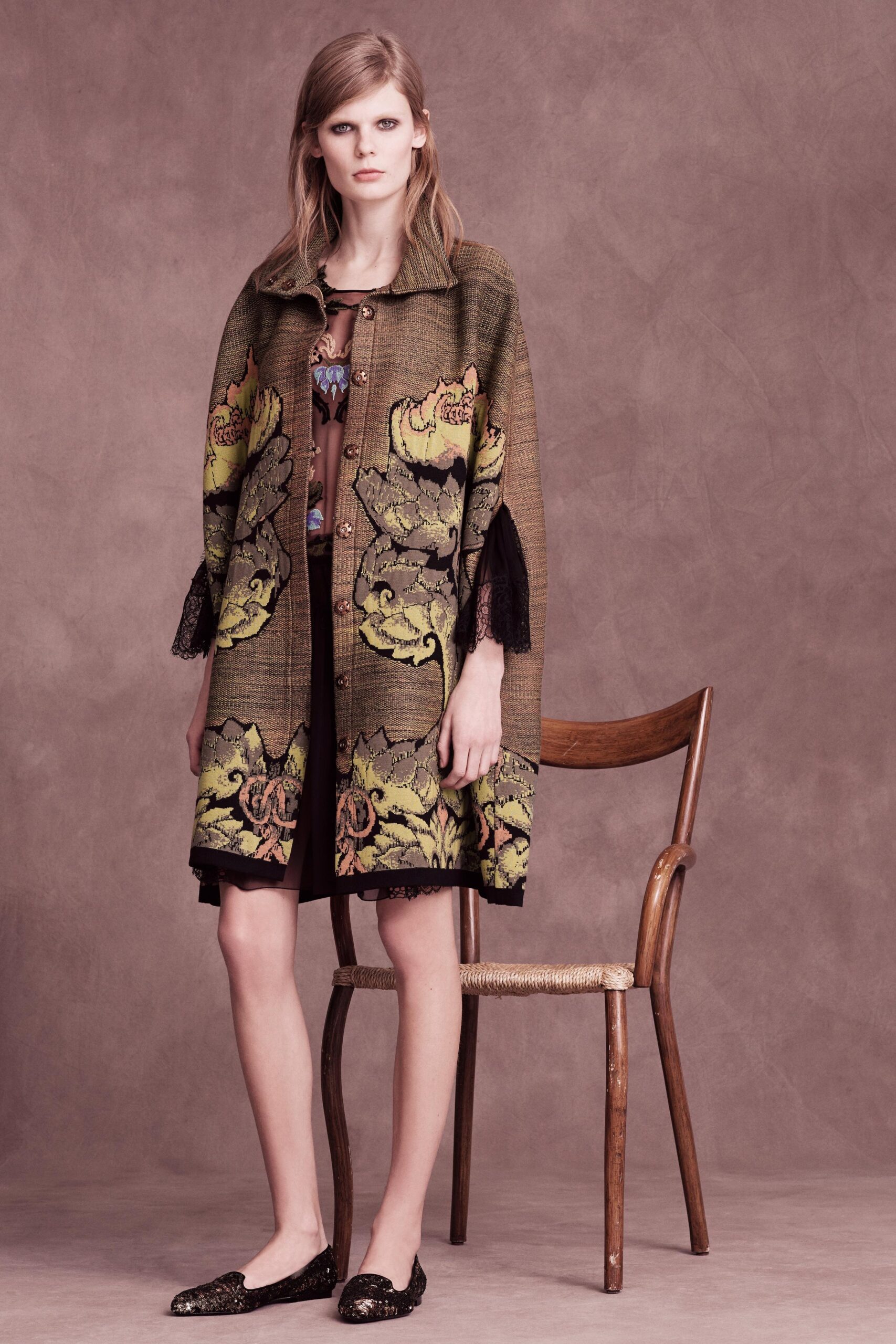 embroidered green coat and brown dress