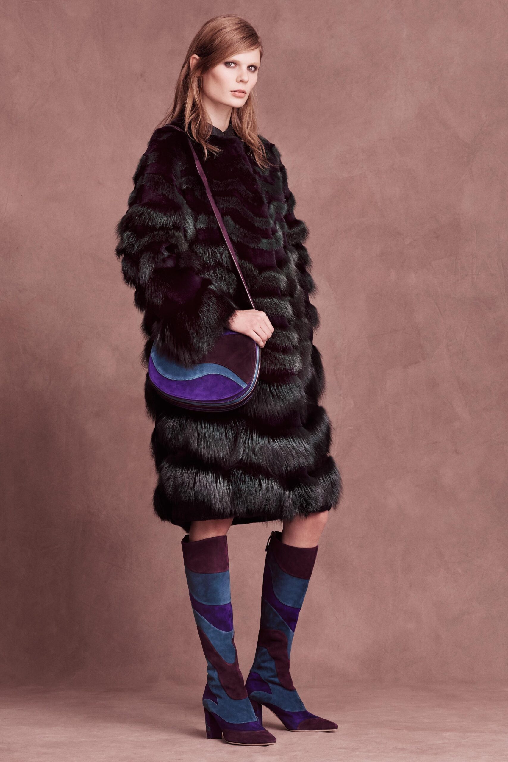 black fur coat with color-blocked boots