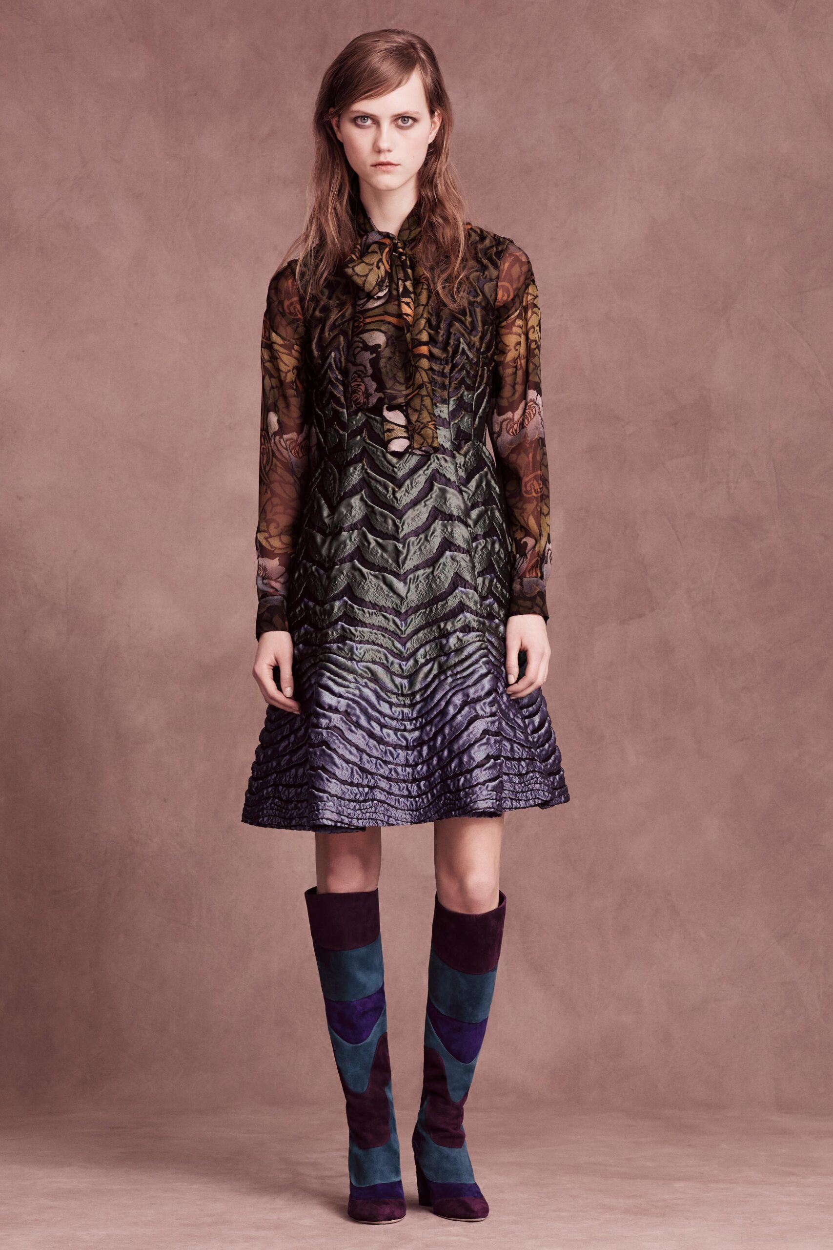 pleated mini dress with color-blocked boots