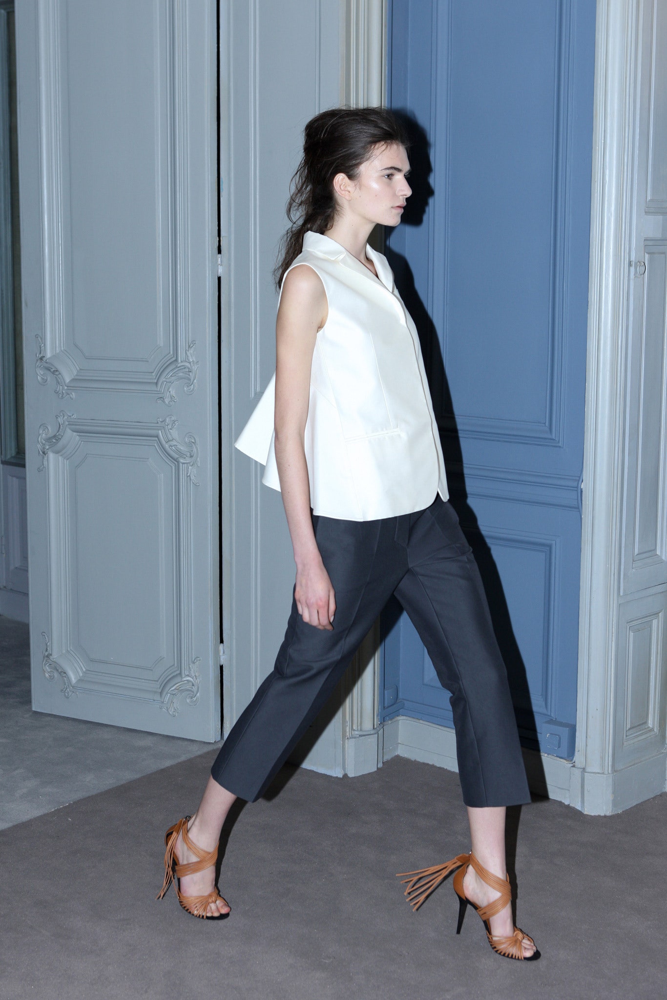 white fitted top black tailored pants