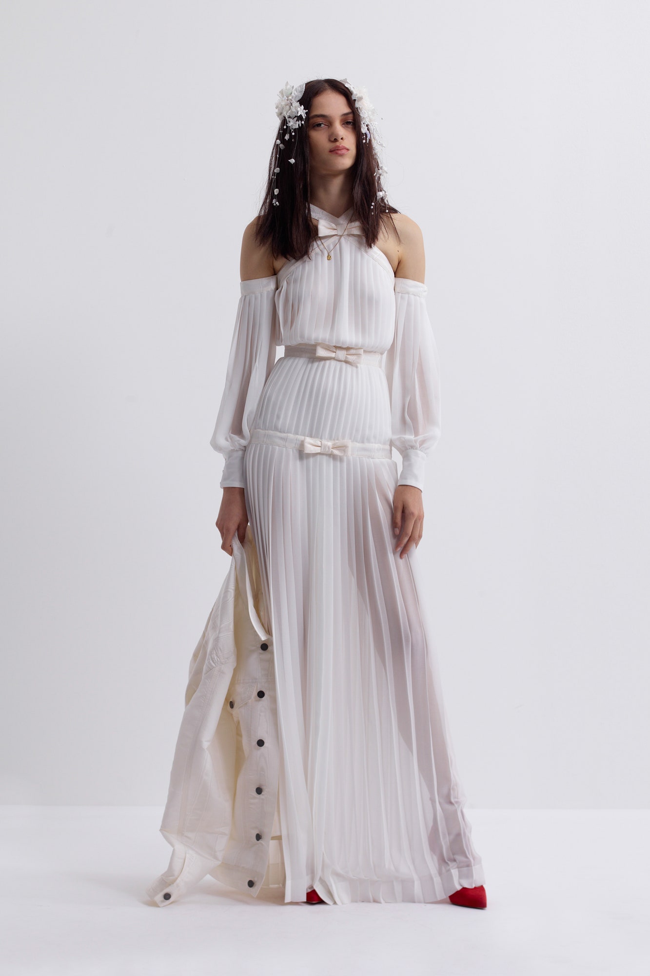 white silk off-shoulder long-sleeve fitted pleated flowing dress