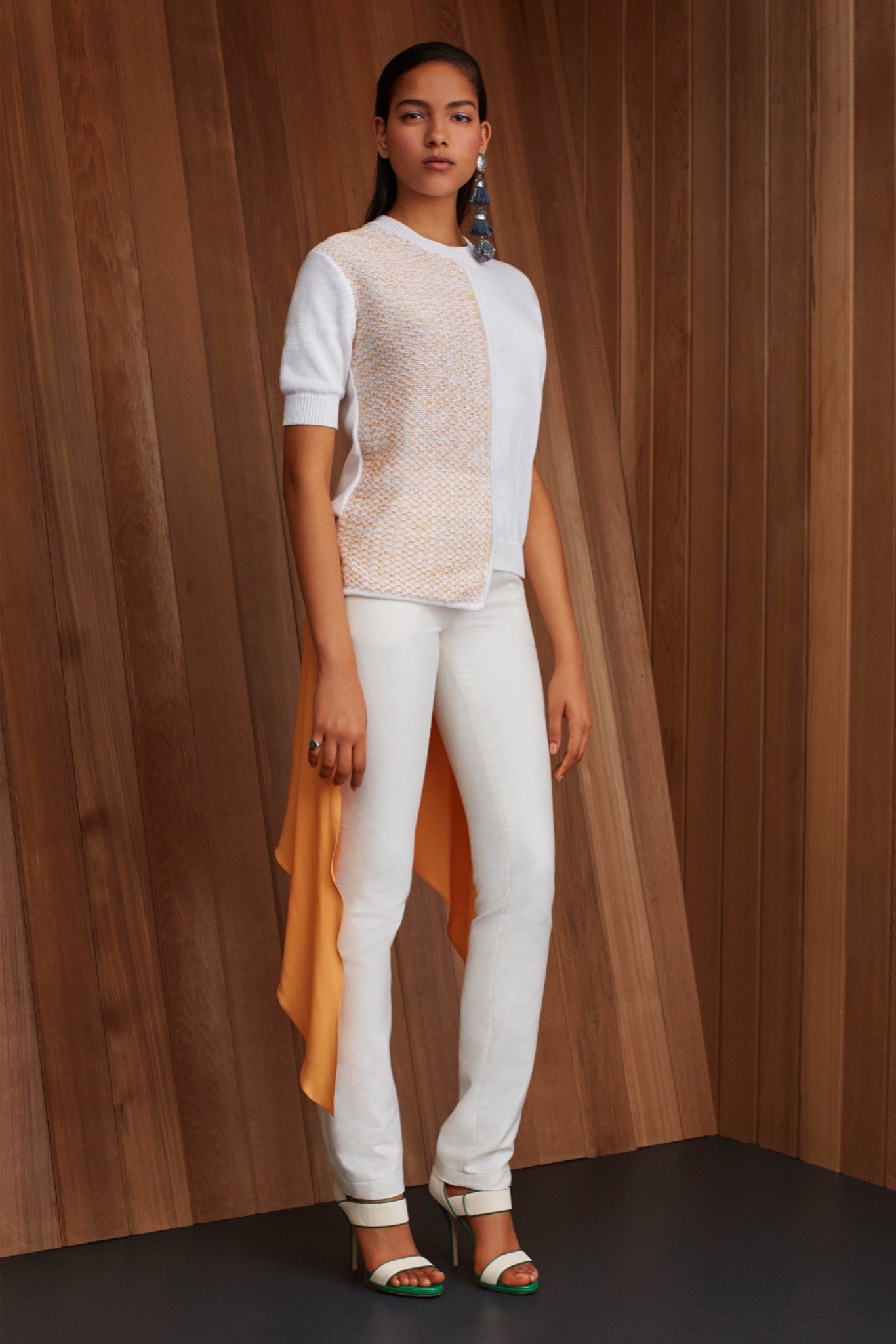 white fitted top with asymmetric hem