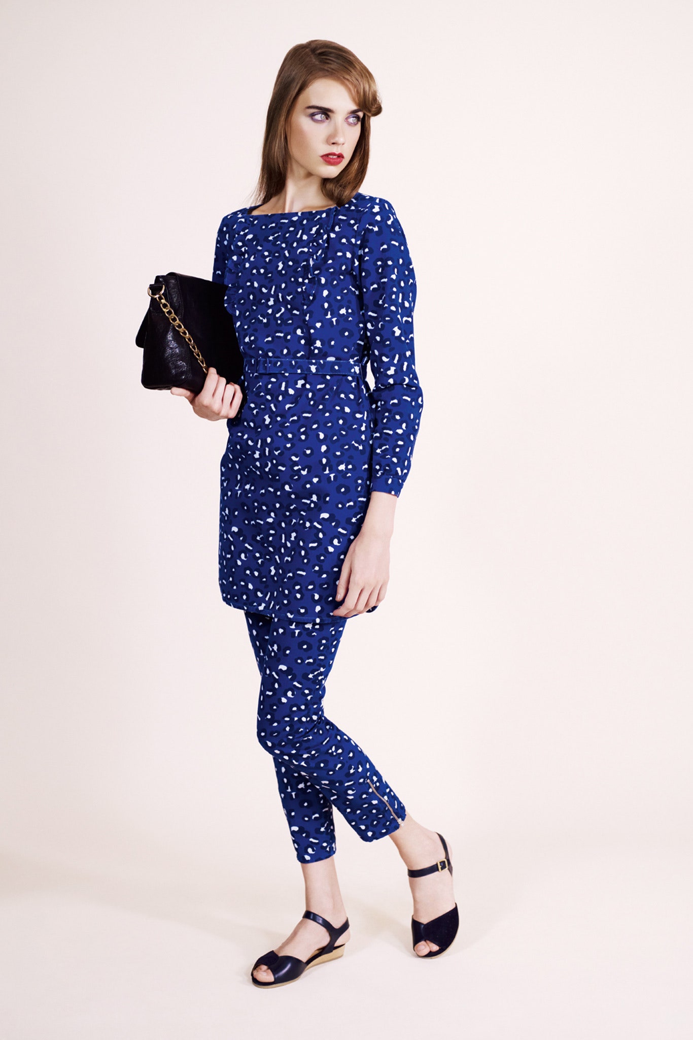 blue printed mini dress with black bag