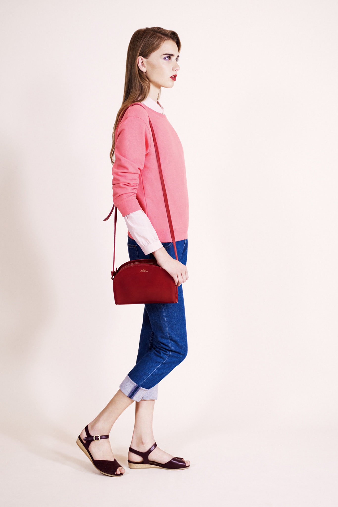 pink relaxed sweater with jeans