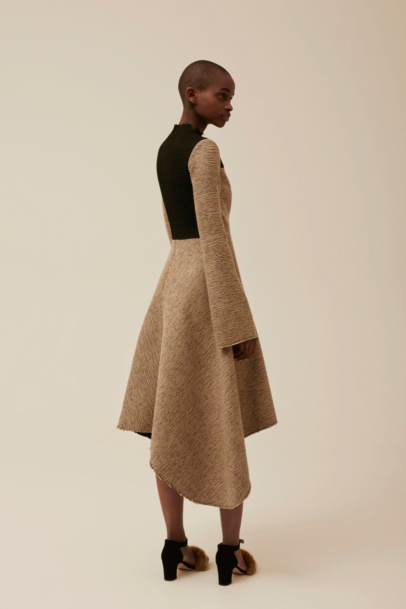 beige and black fitted midi dress