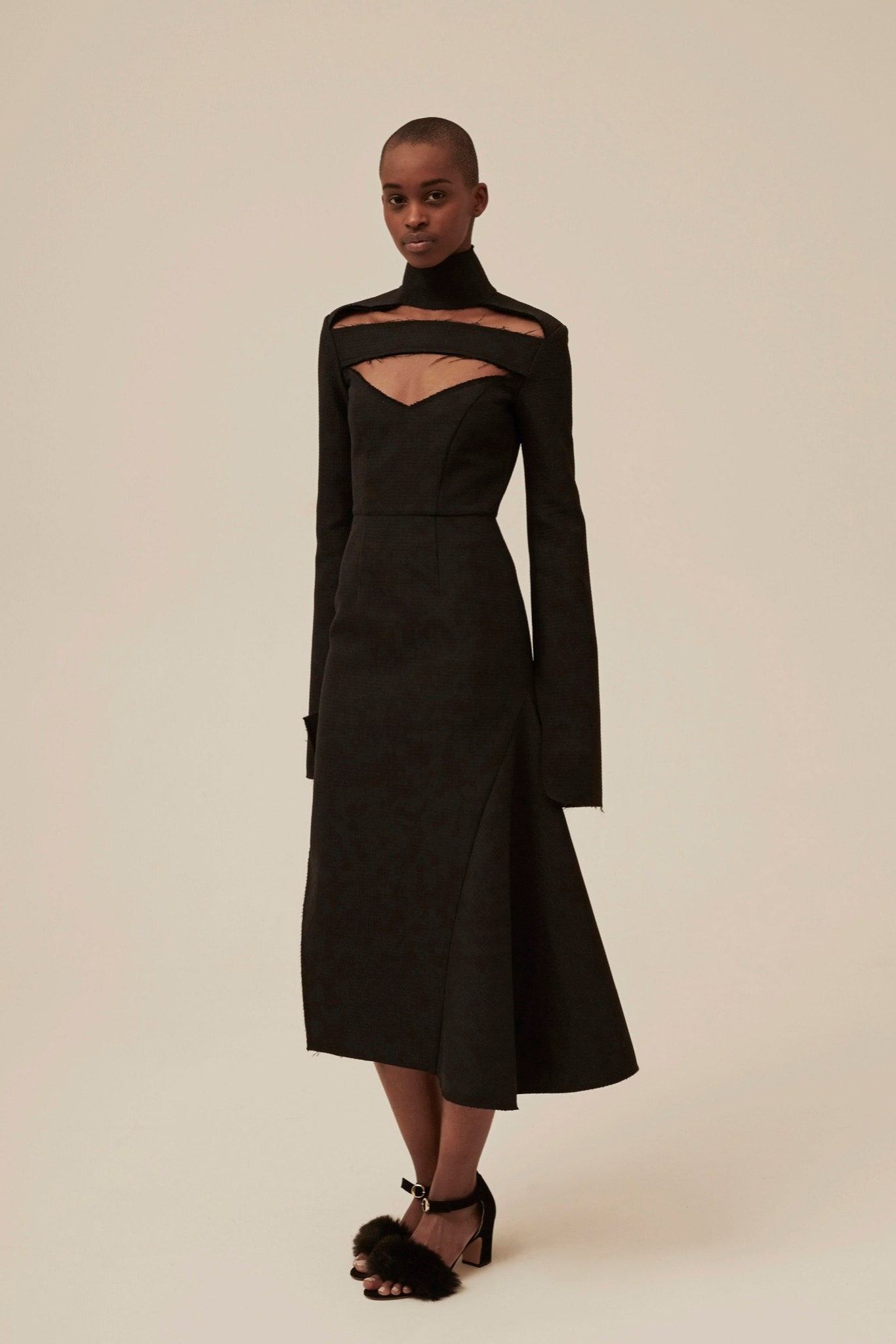 black fitted dress with cutouts