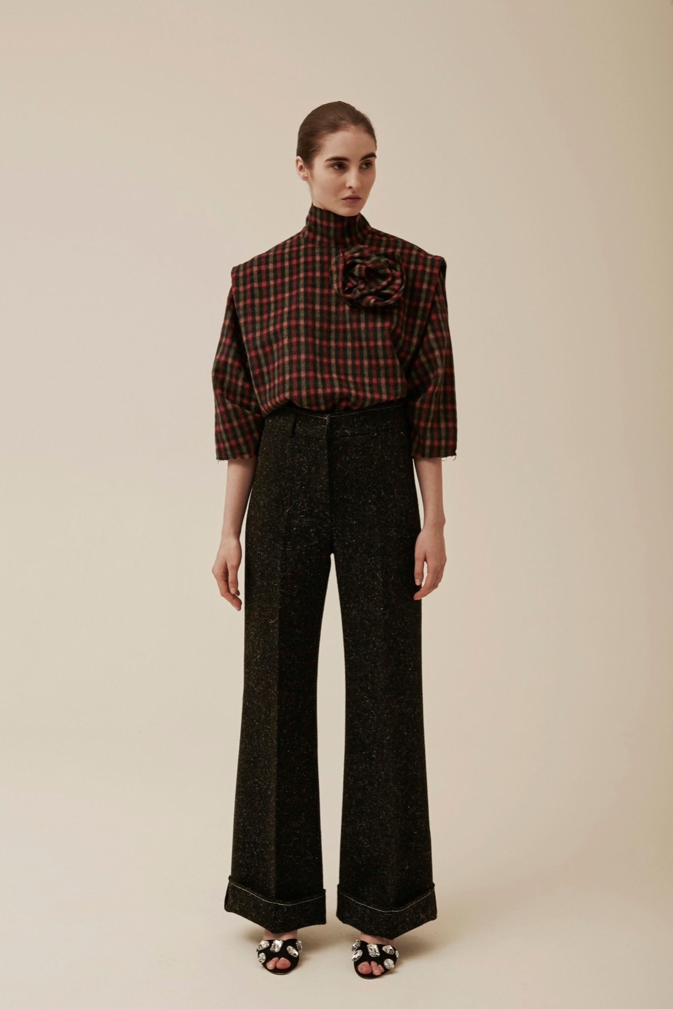 checked top and tailored pants